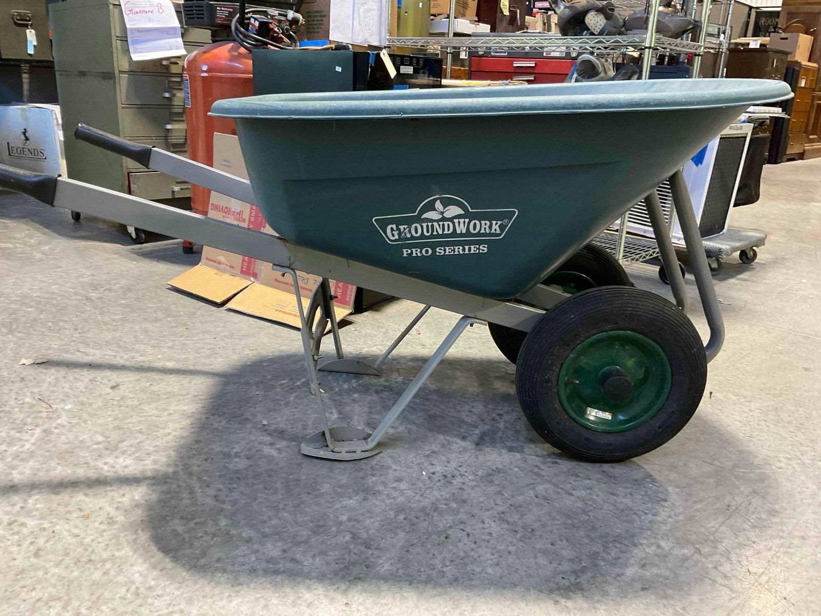 GroundWork Heavy Duty Two Wheel Plastic Wheelbarrow. Good Condition. See pics.: GroundWork Heavy Duty Two Wheel Plastic Wheelbarrow. Good Condition. Has wear indicative of age and use, condition is otherwise good. Measures 34" x 63" x 40" DM-5910 *Freight Required if shipped