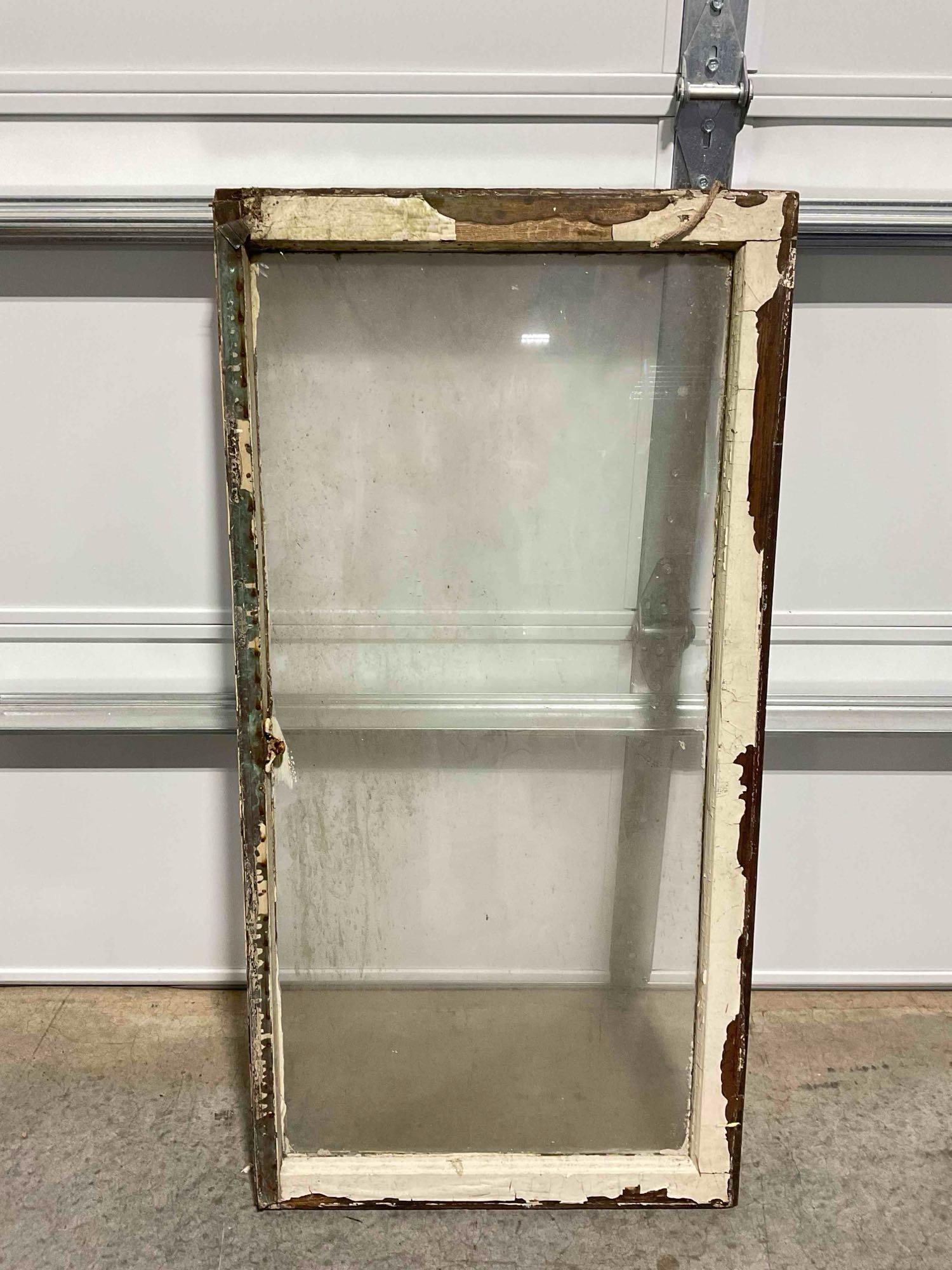 Vintage Reclaimed Glass Window Pane in Wood Frame. Measures 23" x 46" x 2" See pics.: Vintage Reclaimed Glass Window Pane in Wood Frame. Measures 23" x 46" x 2" has wear indicative of age and use, needs a cleaning, condition is otherwise fair. DM-5880 *Freight Required if