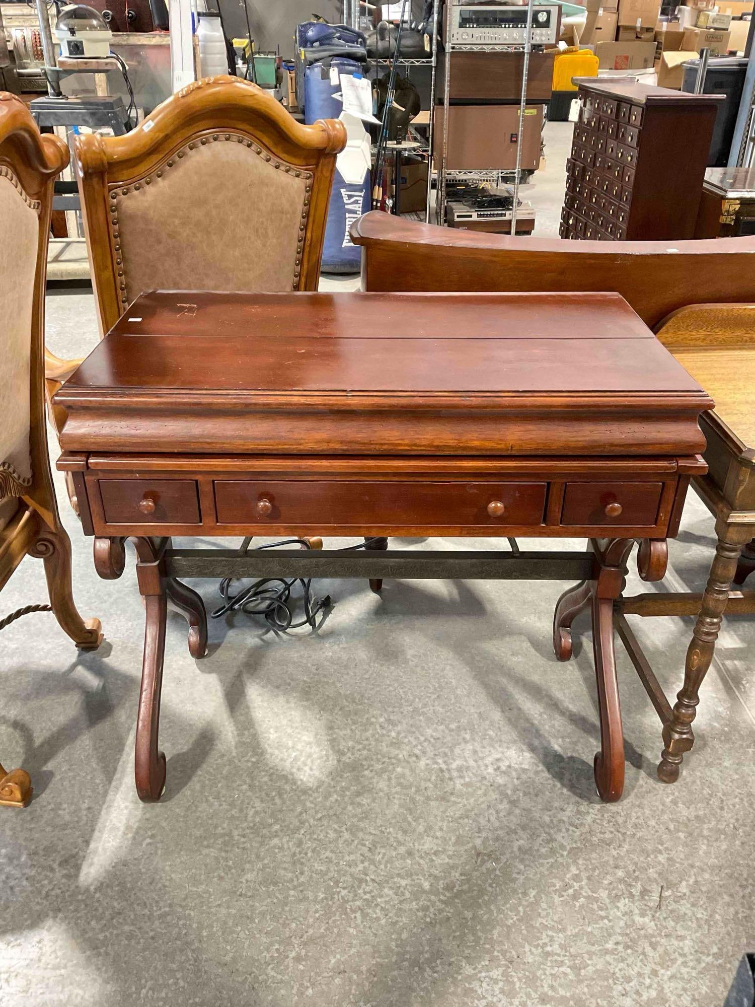 Antique Style Mahogany Wood Finish Writing Desk w/ 3 Drawers & Fold Out Writing Surface. See pics.: Antique Style Mahogany Wood Finish Writing Desk w/ 3 Drawers & Fold Out Writing Surface. Modern, has electrical plug, antique in style. Tested, works. Has wear indicative of age and use, otherwise