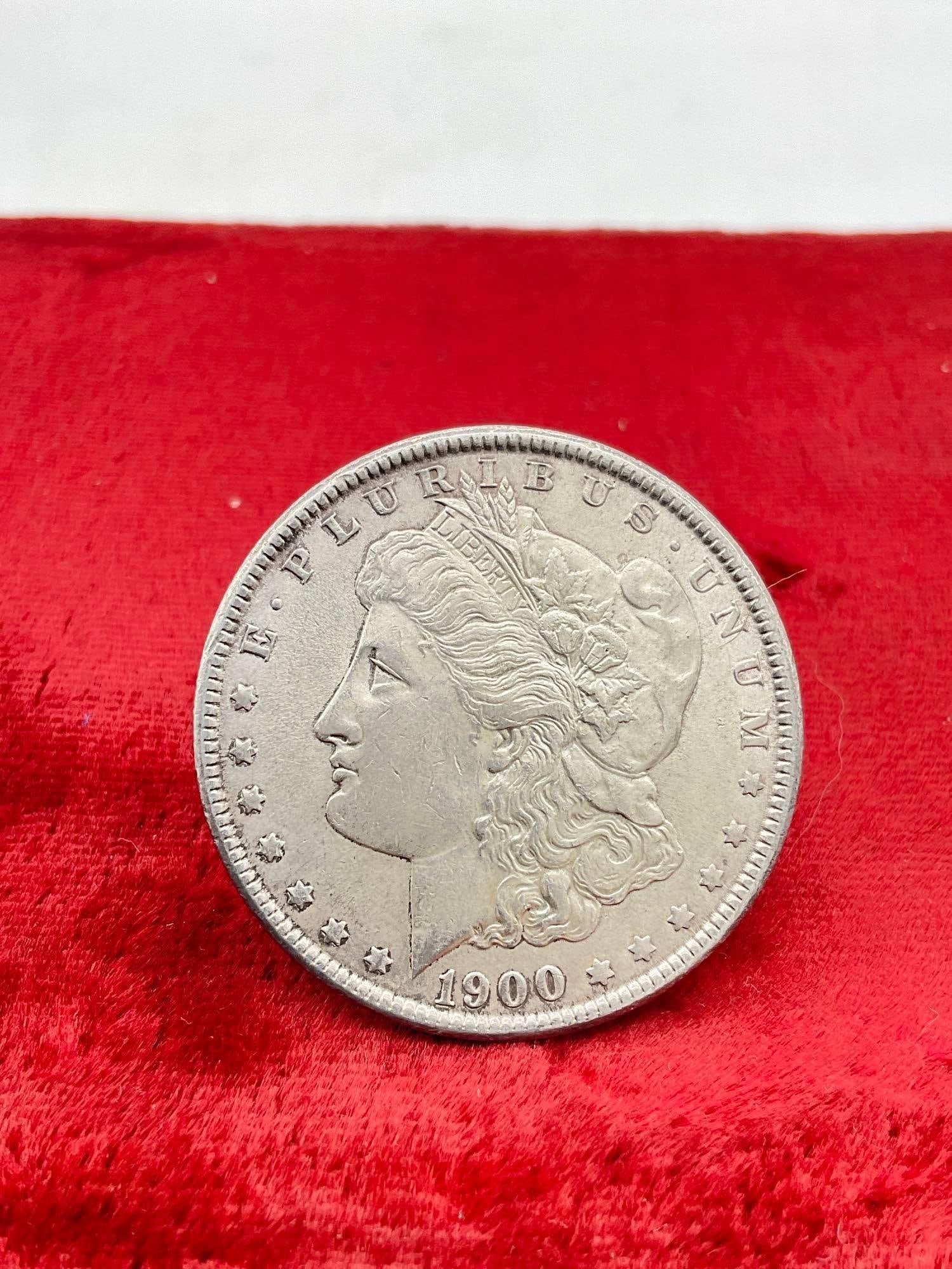 Antique 1900 Silver Morgan Dollar coin is in nice condition see pics: C-5880