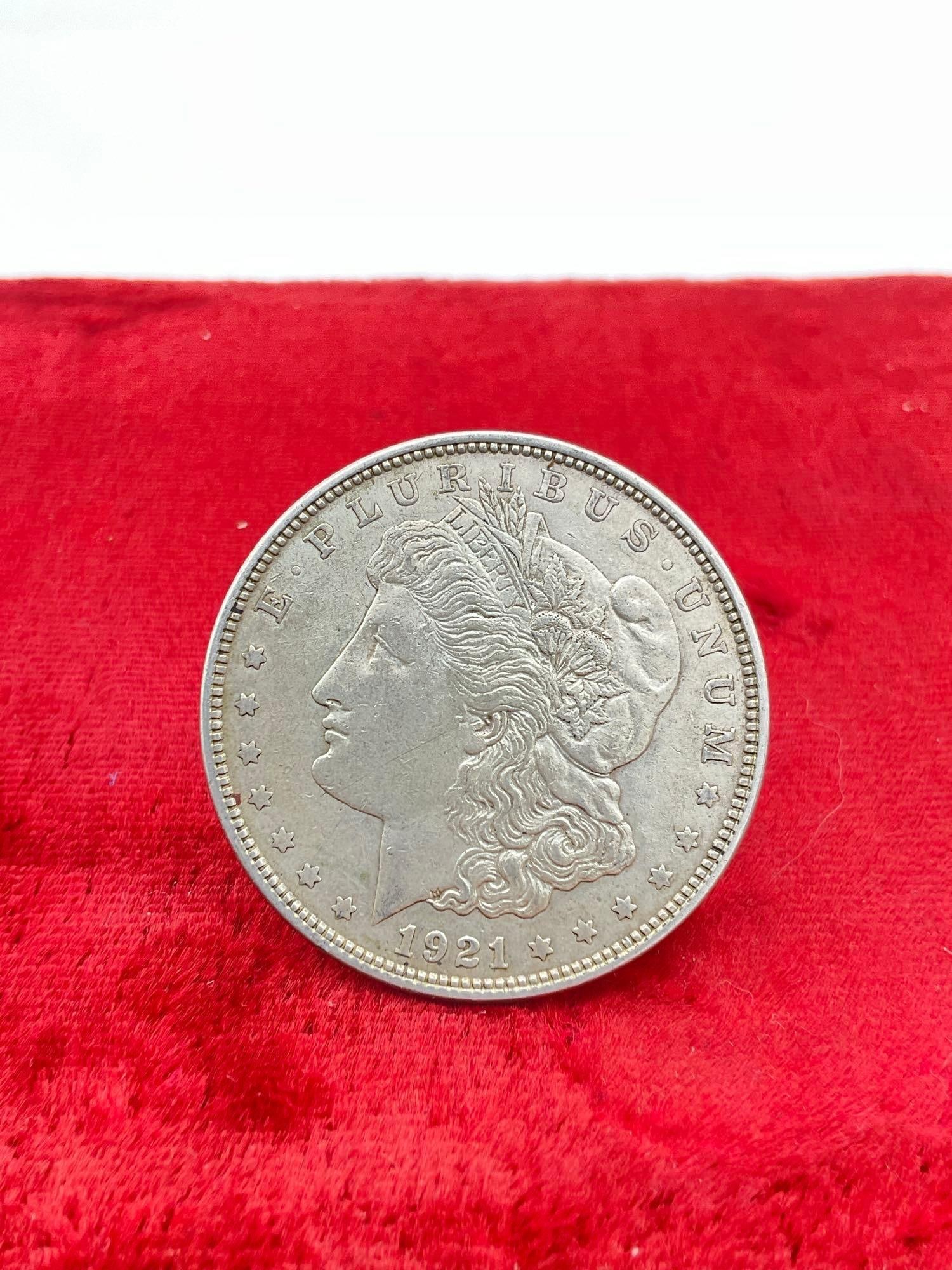 Antique 1921 Silver Morgan Dollar coin is in nice condition see pics: C-5880