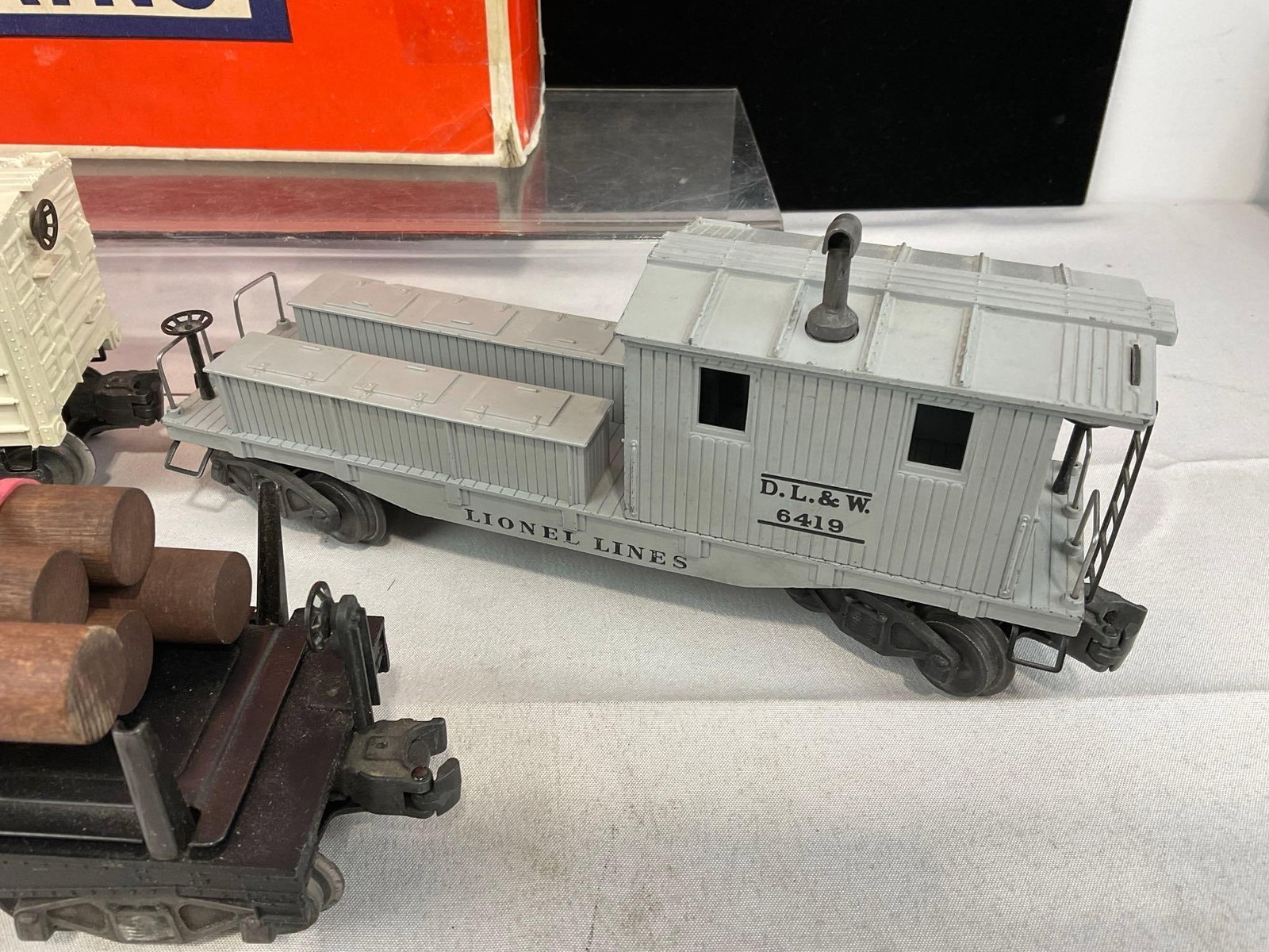 3 O-Gauge Lionel Electric Trains, Log Train 3461, 3472 DL&W Refrig Milk Car & 6419 Caboose w/boxes - 4
