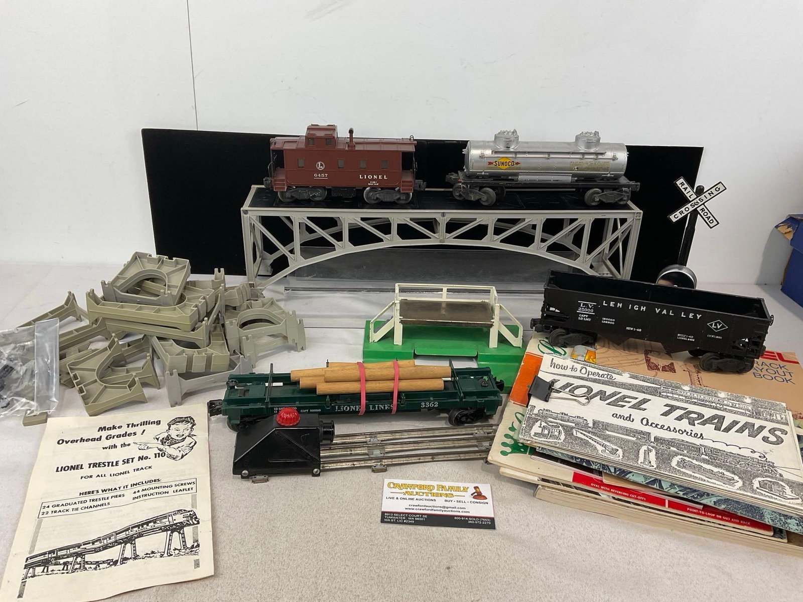 Asst Lionel Trains & Acces. Booklets, Trestle Set 110, 6487 Caboose, Logcar 3362, Oil & Gondola C...: O-Scale pieces. Appears to be in good shape. The piece measures approx 6h x 20w x 17d inches. See pics. E-5430