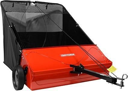 Large Craftsman 42-inch tow-behind lawn sweeper w/catcher: First pic is a stock photo, this one is black on black. Seems to operate nicely. Appears to be in good shape. The piece measures approx inches. See pics. E-5600 *Freight Required if shipped,