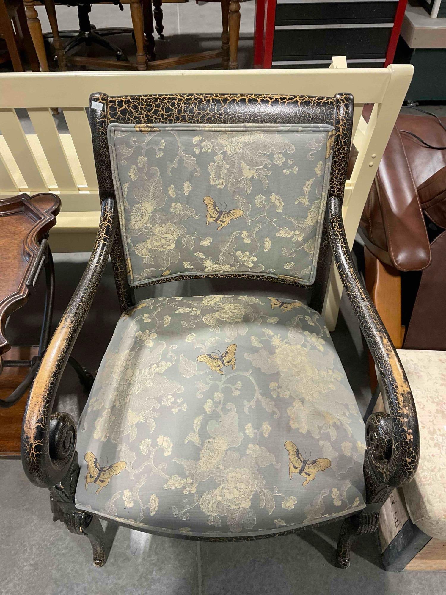 Antiqued Black Painted Armchair w/ Modern Lovely Blue Butterfly Fabric. Good Condition.: Antiqued Black Painted Armchair w/ Modern Lovely Blue Butterfly Fabric. Good Condition. Piece has wear indicative of age and use, seat has a minor stain, condition otherwise looks to be good.