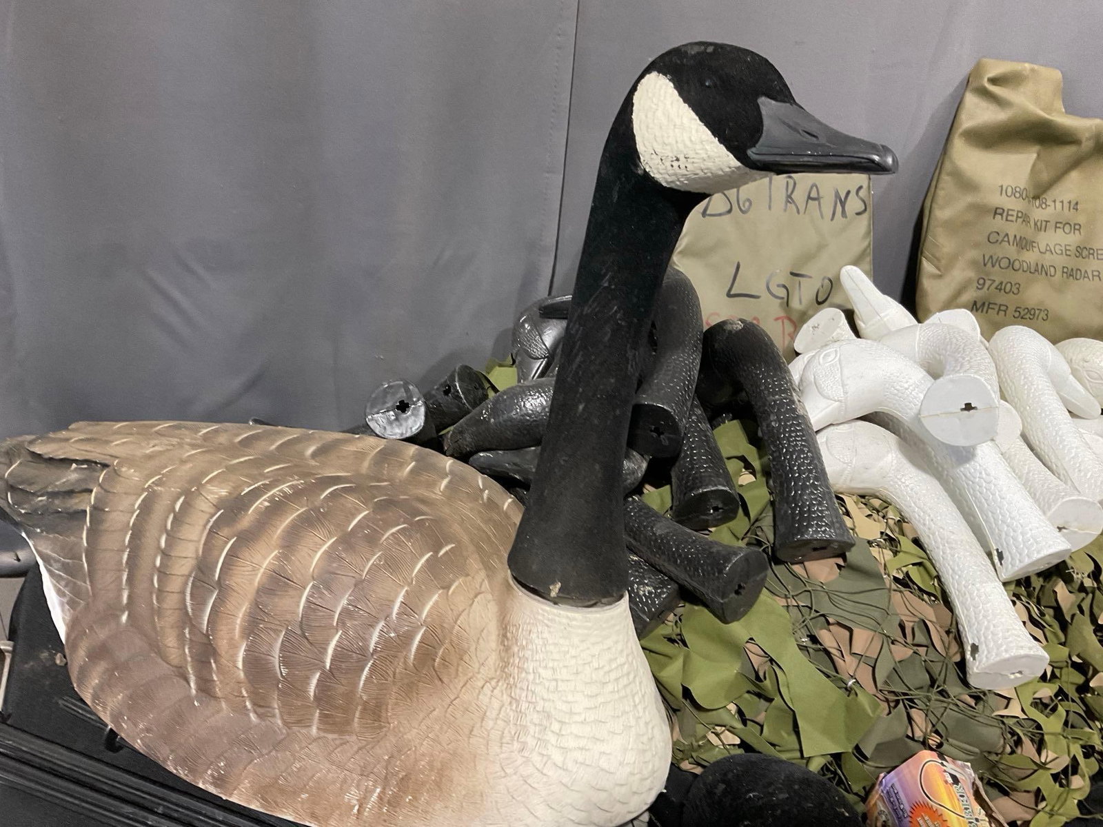 Camouflage Screen, Many Duck Head Decoys w/Stakes, & cloth covers, box full, uncounted - 5