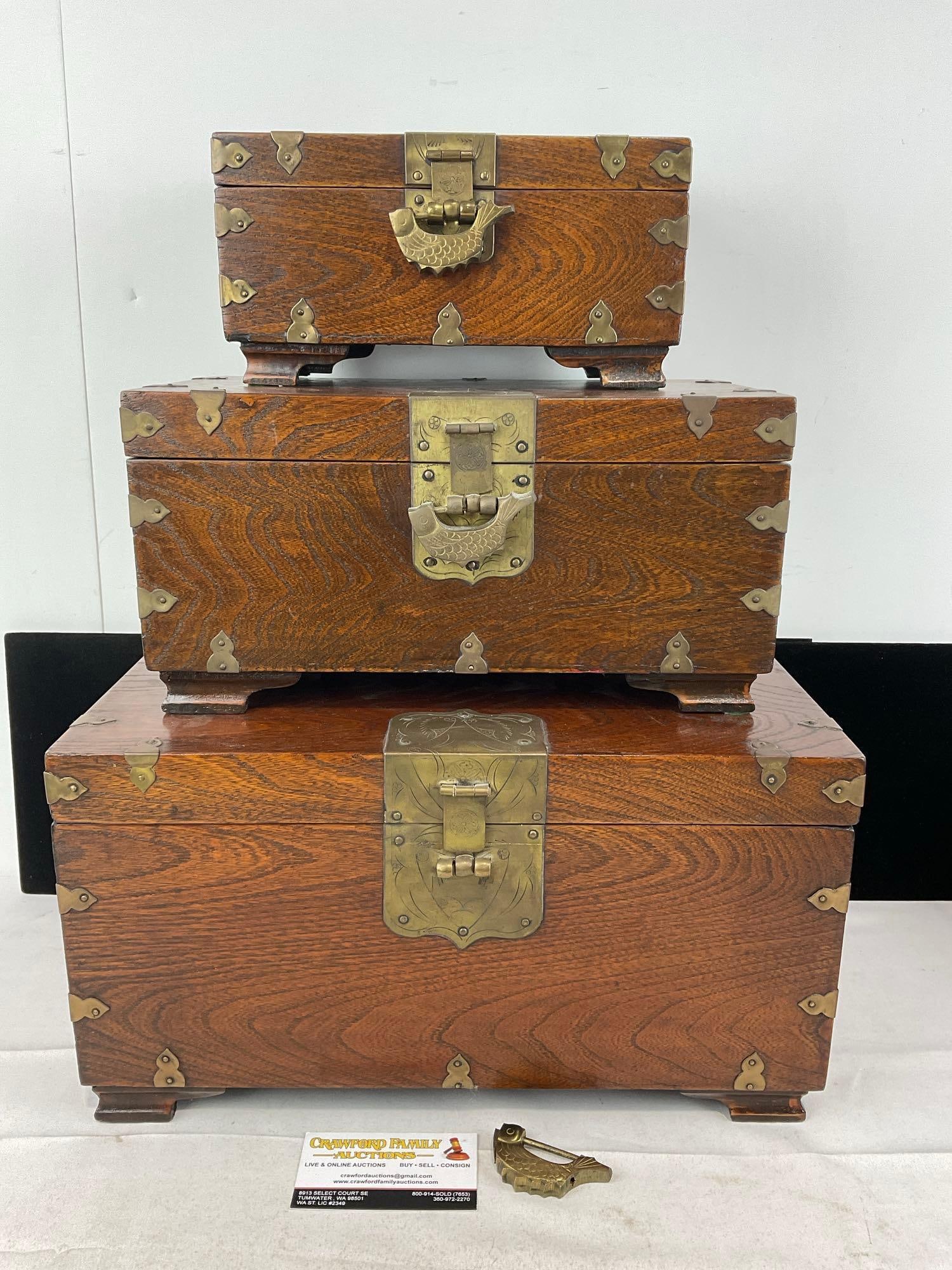 3 Indian Brass Banded Rich Stained Wooden Jewelry/Trinket Boxes, w/Locks, no key: Two are locked still, 1 has a lock, but includes no keys. Appears to be in good shape. The pieces in total measures approx 17h x 15w x 11d inches. See pics. E-5830