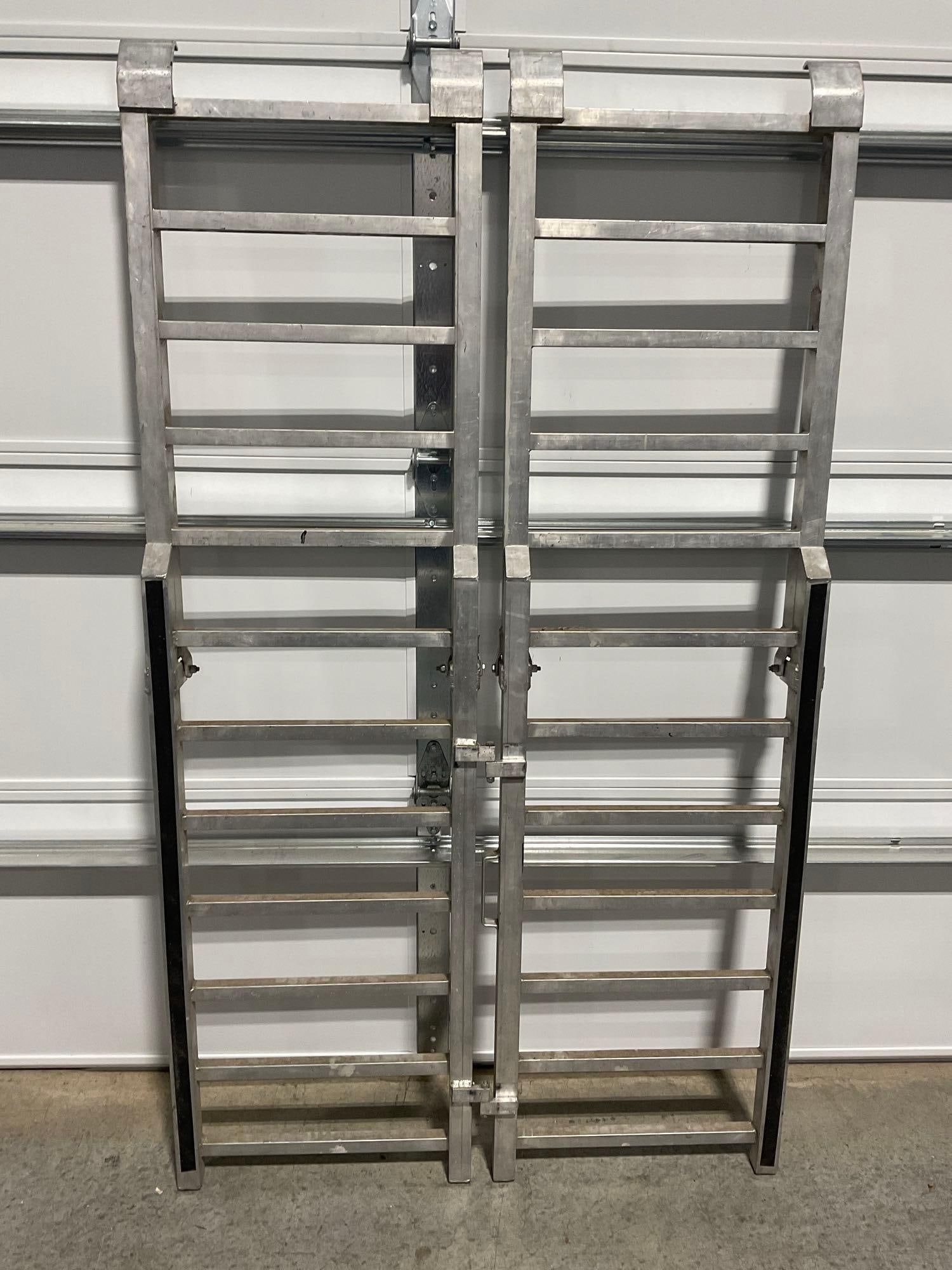 Double Wide Aluminum Folding Ramp, 44 inch wide, 70ish inches when unfolded: Appears to be in good shape, some scratches and wear. The piece when folded up measures approx 45h x 22w x 9d inches. See pics. E-5600 *Freight Required if shipped, Buyer Arranged/Responsibility*