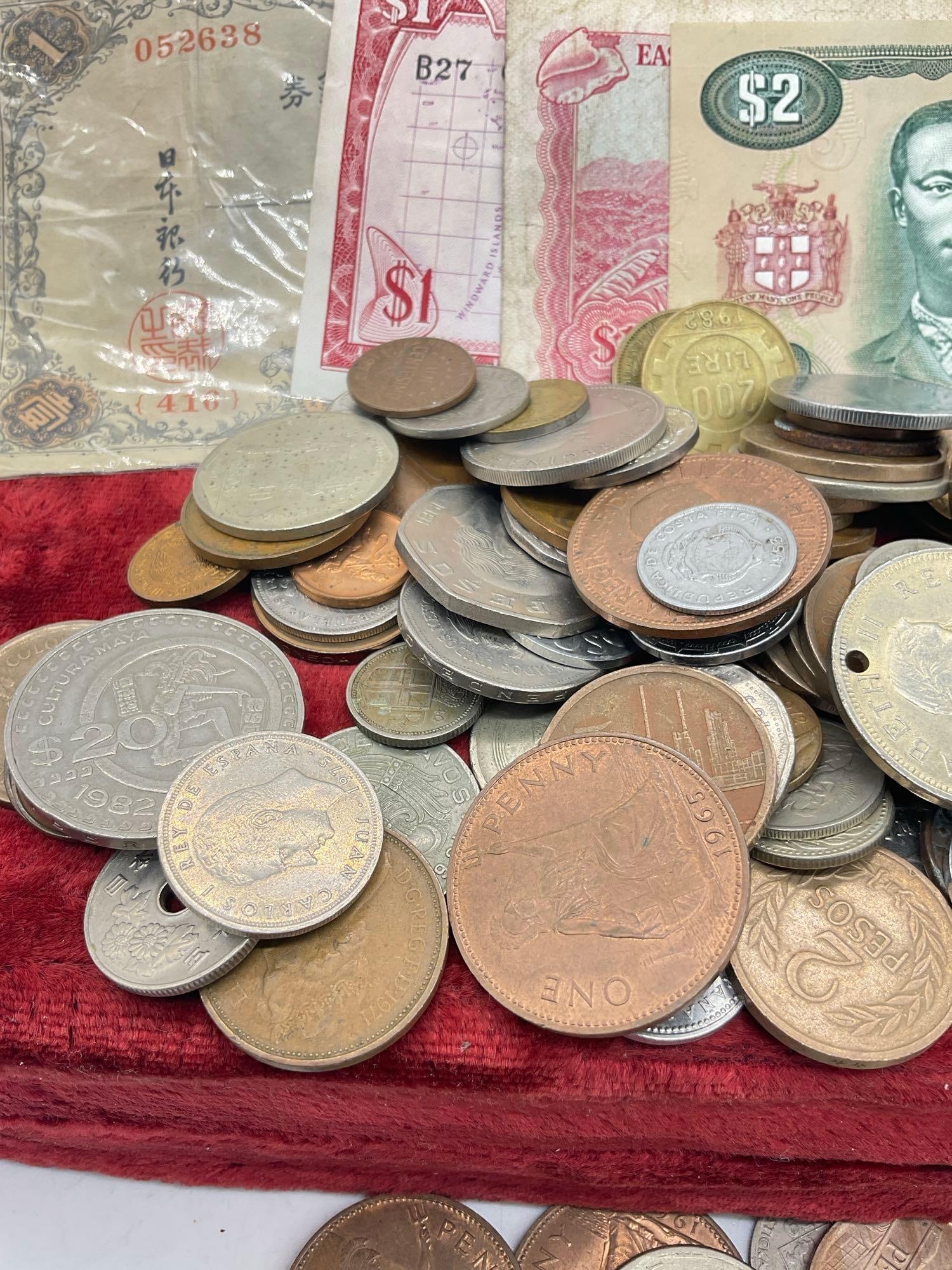 Large selection of foreign Currency and coins from around the world. - 2