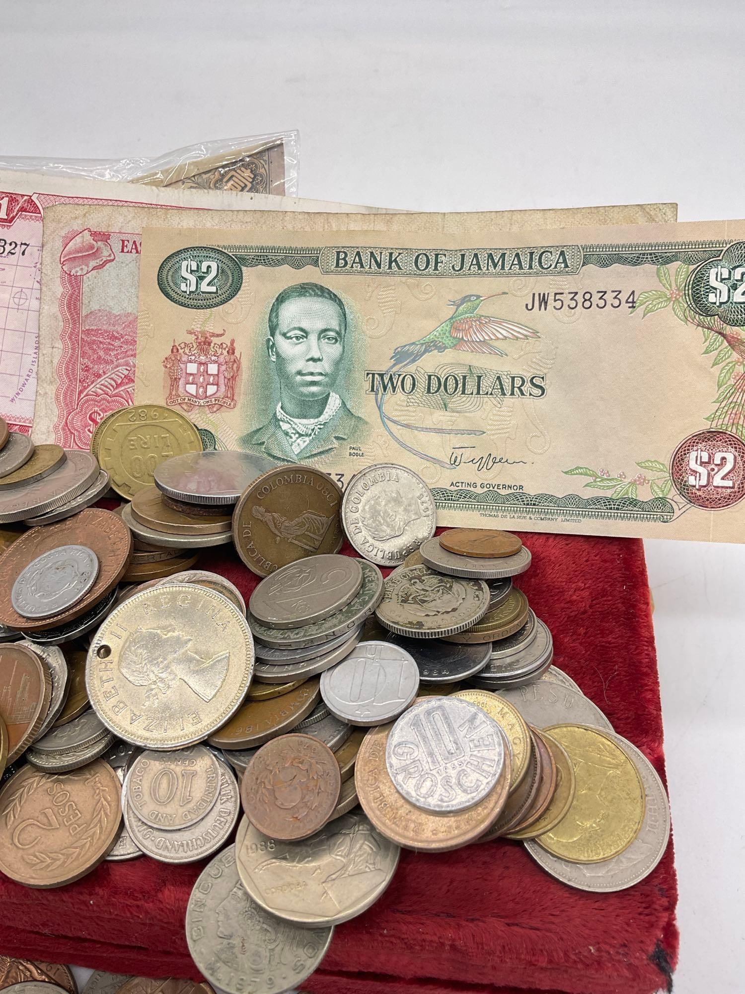 Large selection of foreign Currency and coins from around the world. - 3