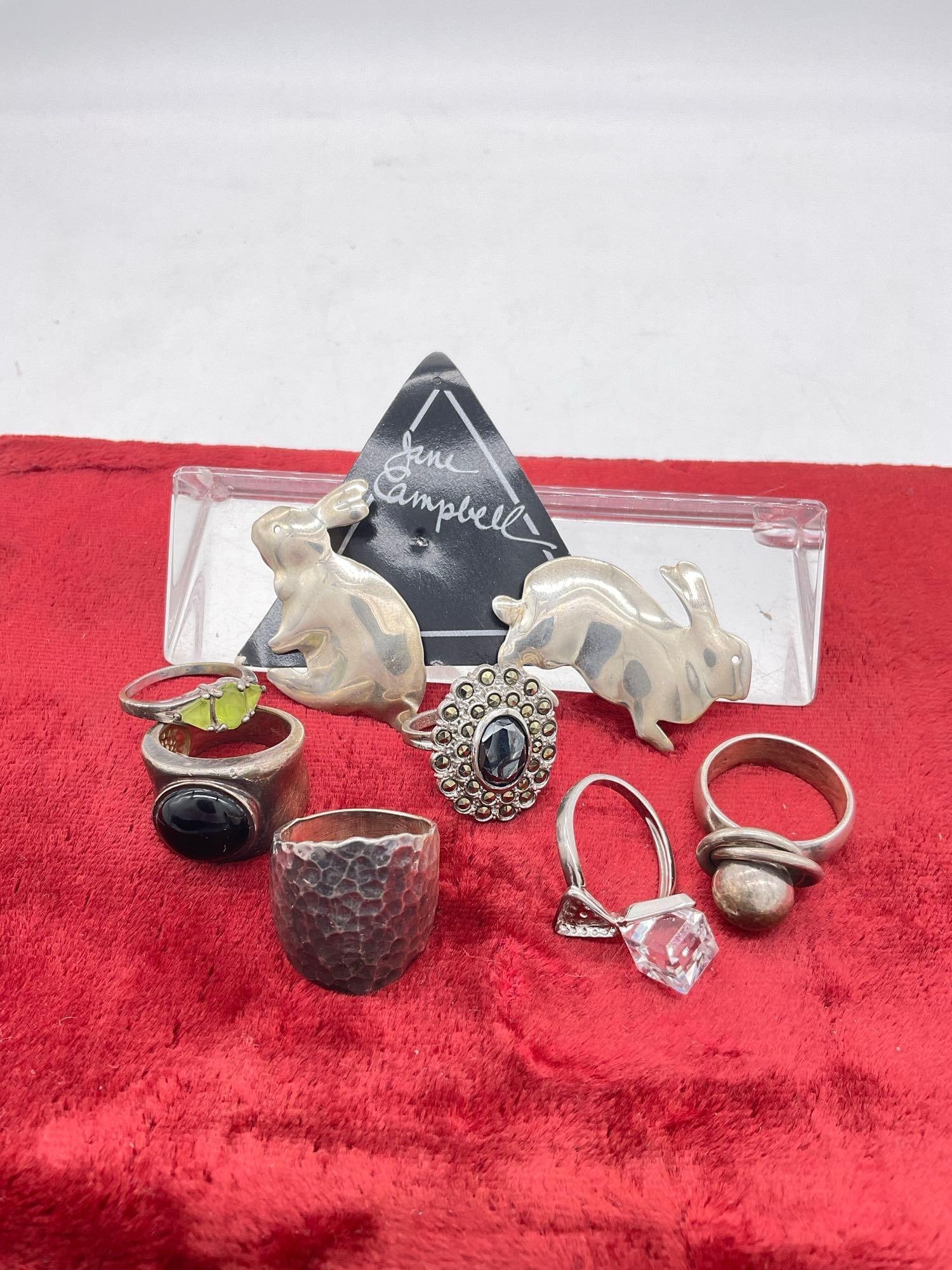 6 x Sterling silver rings various stones & sizes, + a pair Jane campbell Sterling Bunny Rabbit Pins: One ring is missing a cube shaped setting see pics 52.52 grams 