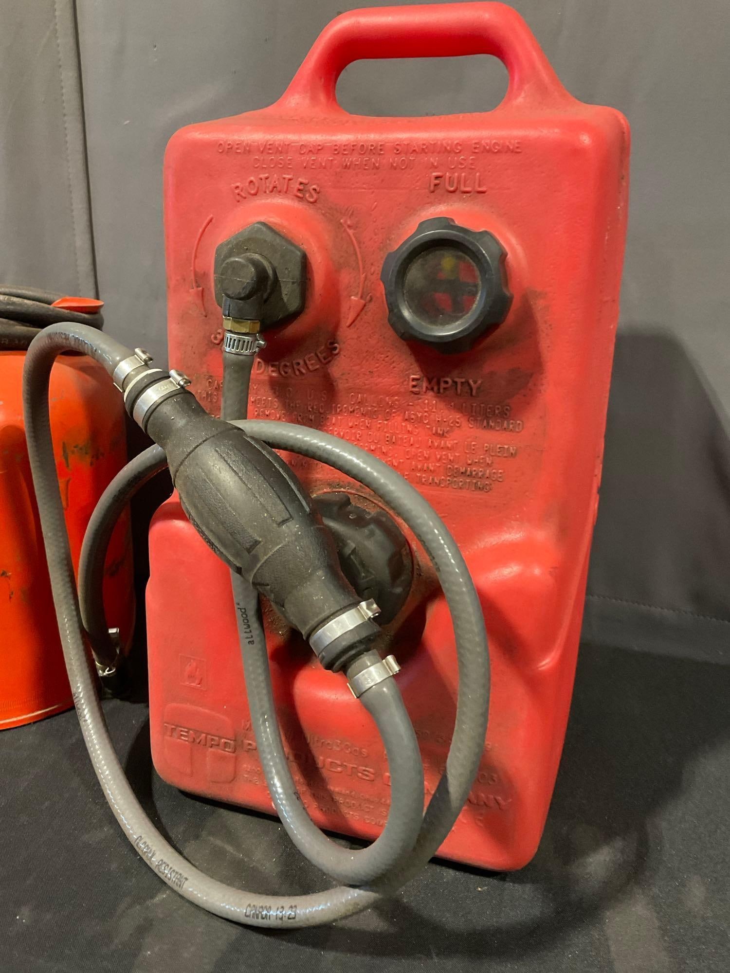 OMC Accessories & Tempo Products Company Gas Cans, both have some gas - 4