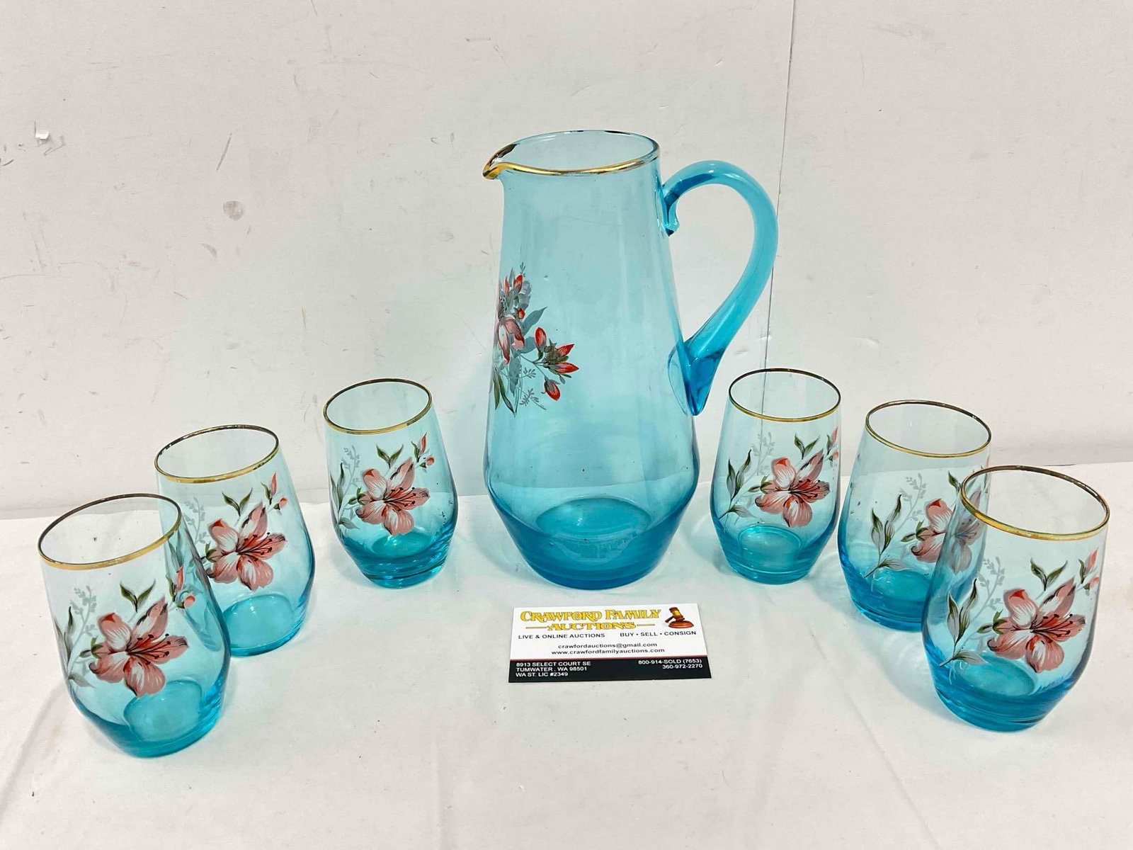 Vintage East German Aqua Blue Glass Pitcher & 6 pcs Glasses w/ Painted Flowers. See pics.: Vintage East German Aqua Blue Glass Pitcher & 6 pcs Glasses w/ Painted Flowers. Minor wear indicative of age and wear, otherwise looks to be in good condition. Largest Measures 5" x 4" x 9" DM-577
