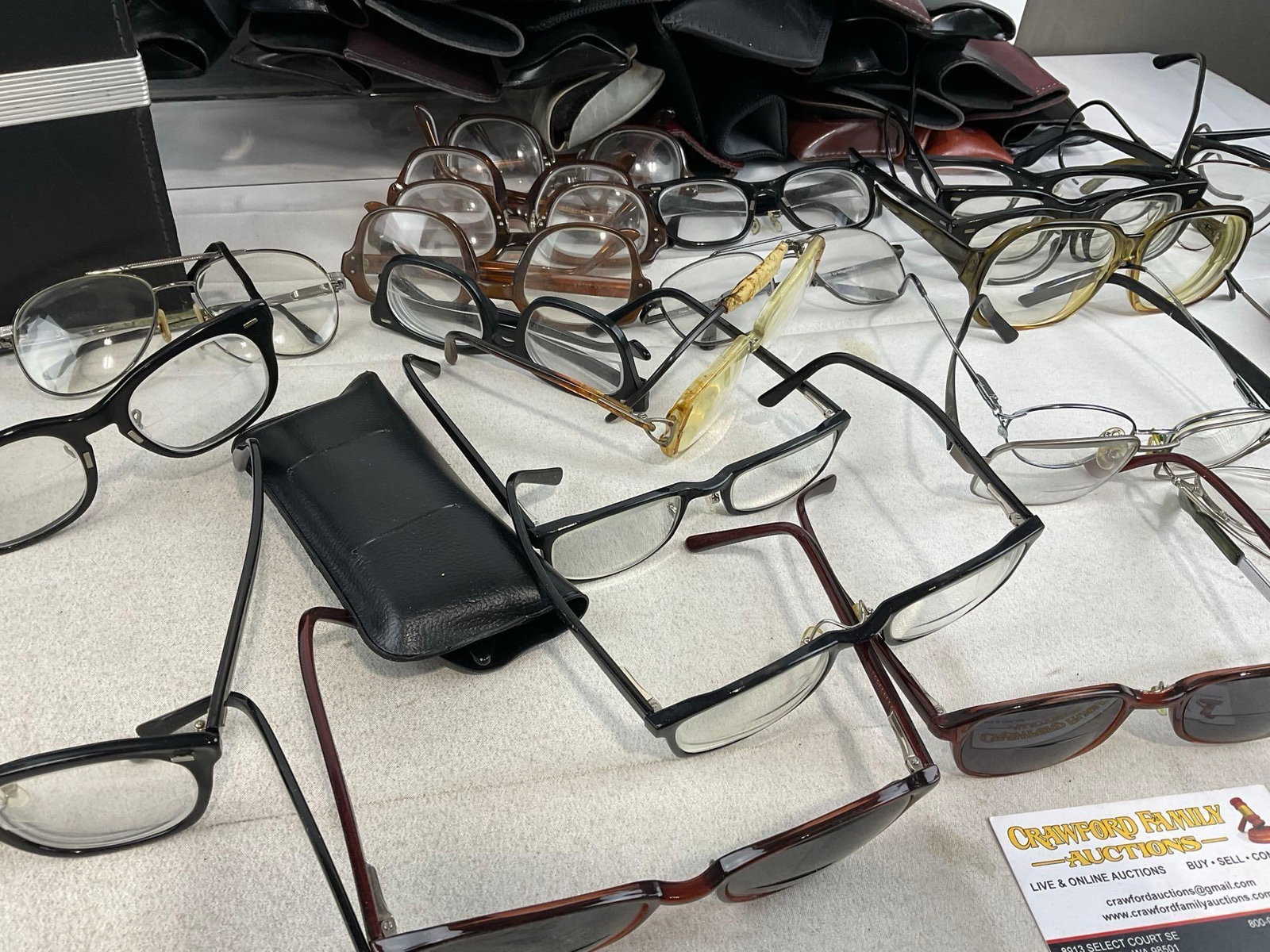 roughly 32 pairs of Glasses, w/cases, variety of prescriptions, & leather case - 3