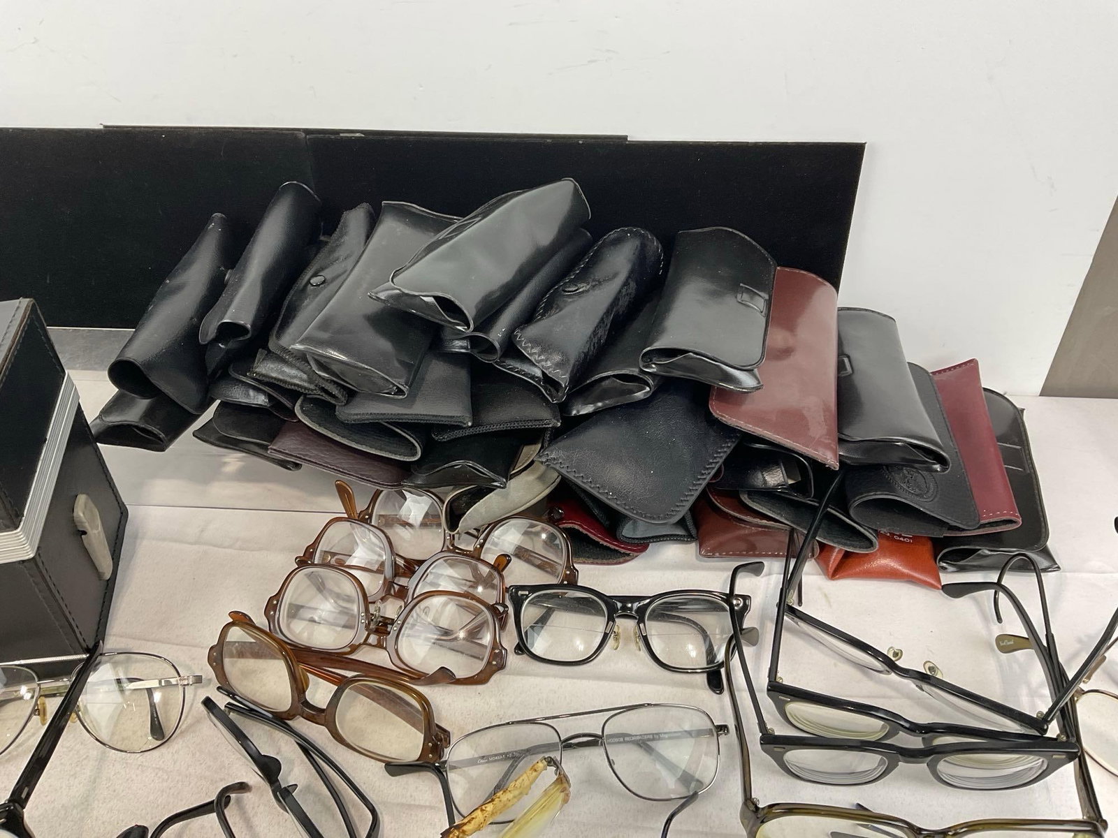 roughly 32 pairs of Glasses, w/cases, variety of prescriptions, & leather case - 5