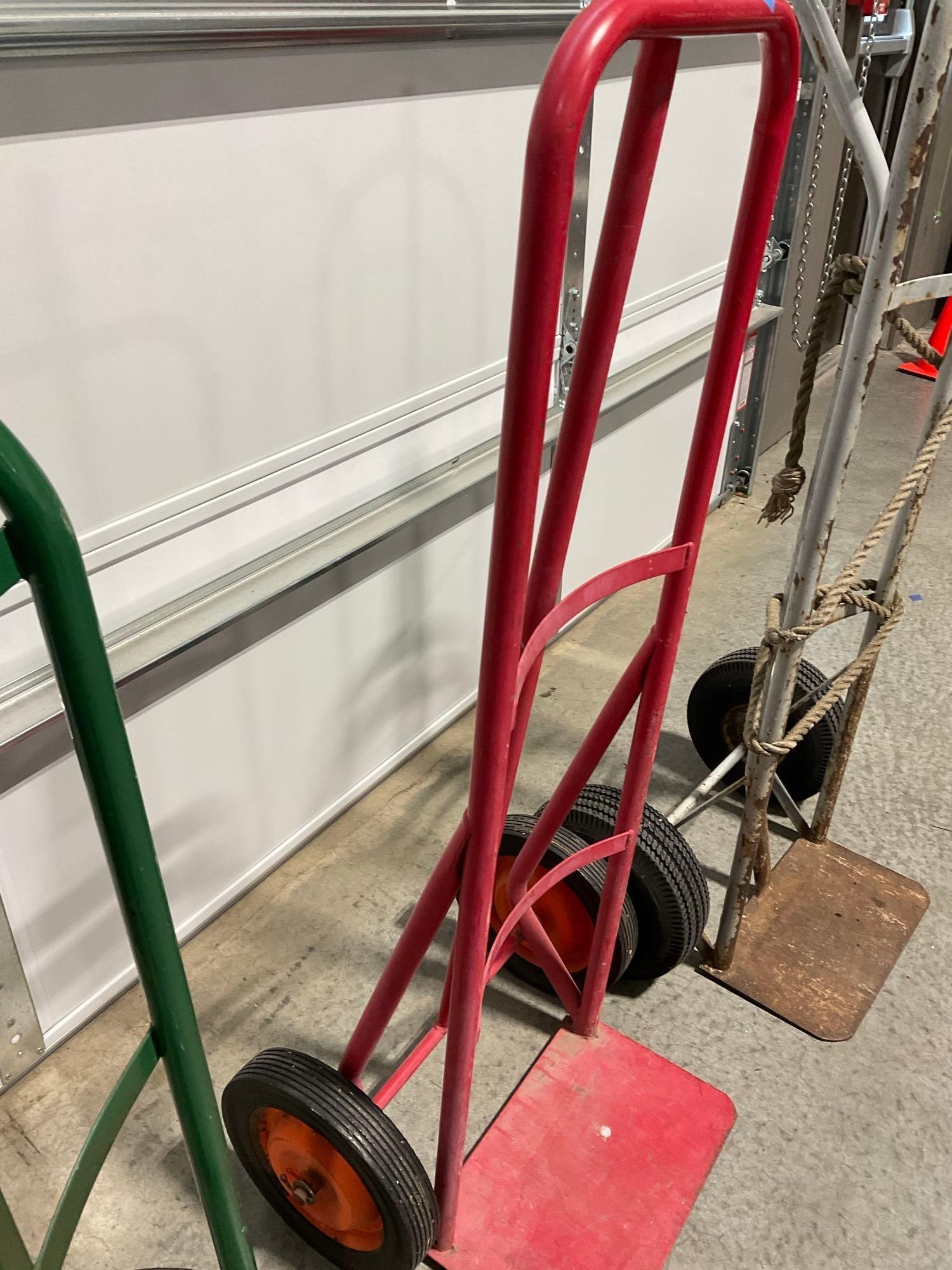 3 Hand Truck Steel Dollys in used shape, Red, Green & Bare Steel, solid & inflatable tires - 3