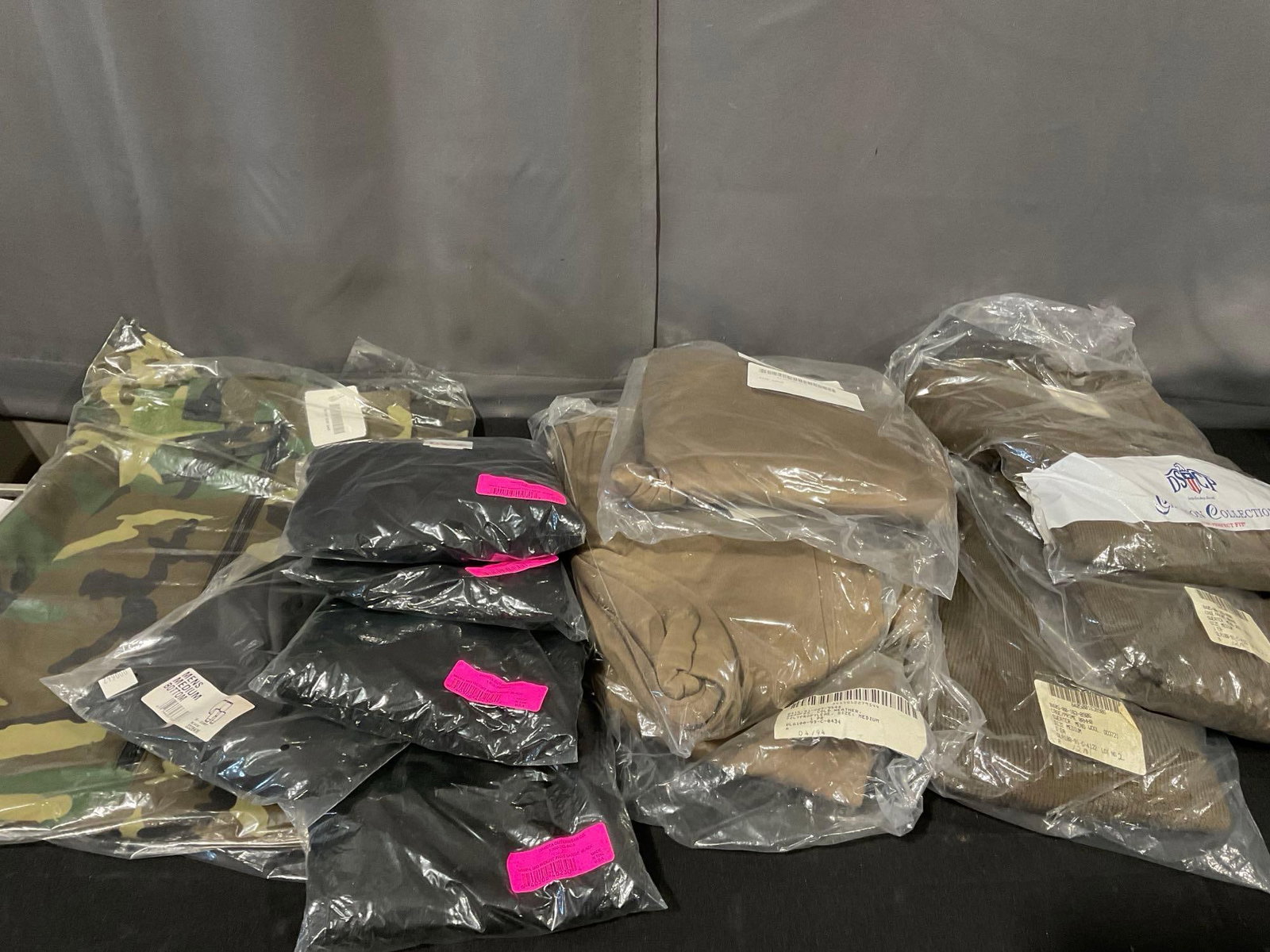 Several Cold Weather Clothes in packaging, Size Medium & Large Trousers, & Pants, Large Henley: Appears to be in good shape. The piece measures approx 17h x 25w x 16d inches. See pics. E-5600