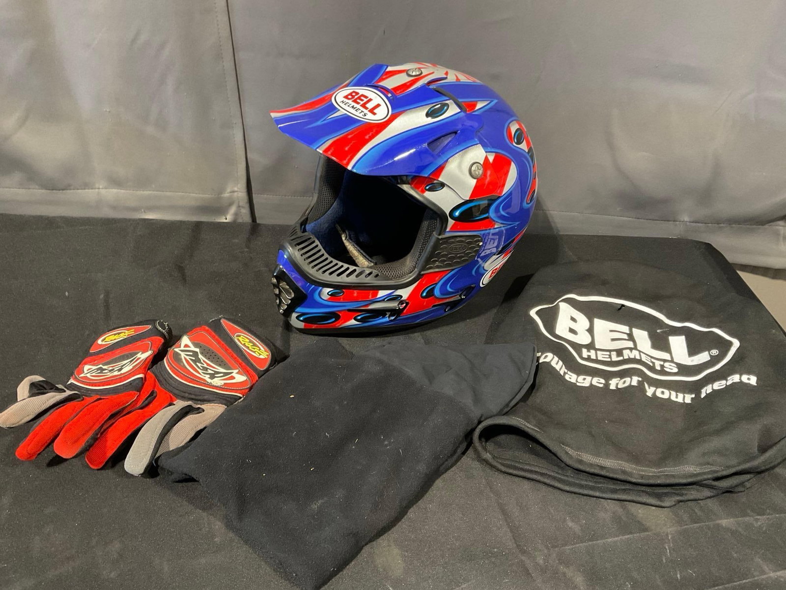 Bell Helmet Size 7-5/8 GR.1400, Red/White/Blue theme, Small Gloves, & Cover: Appears to be in good shape. The pieces fit in a box that measures 13h x 15w x 11d inches. See pics. E-5600