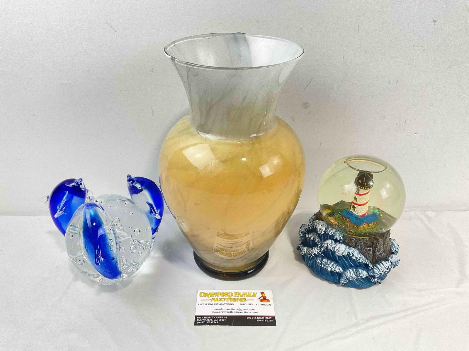 3 pcs Decorative Glass Assortment, incl. Dolphins Paperweight & Lighthouse Snowglobe. See pics.: 3 pcs Decorative Glass Assortment, incl. Dolphins Paperweight & Lighthouse Snowglobe. Minor wear indicative of age and use, condition diction is otherwise good. Snowglobe Plays The Impossible