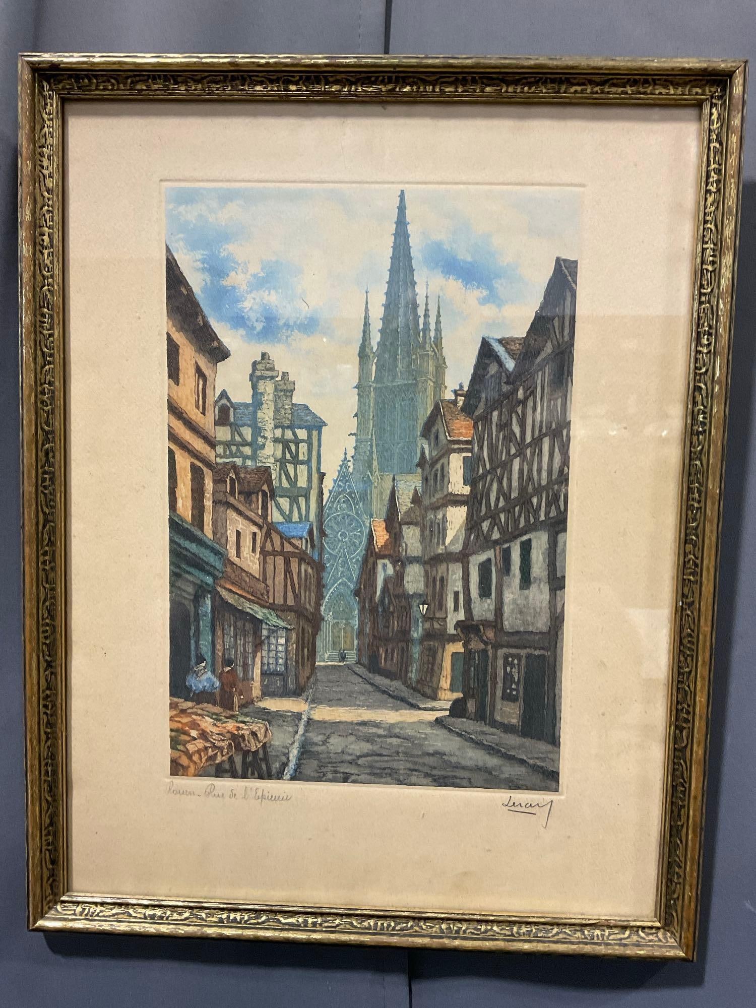 Framed Hand-Tinted Etching titled Rouen Rue Se LEpicerie by Jules Leray, (1875-1938), 19x15 inches: French Grocery Street Scene. Appears to be in good shape. The piece measures approx 19h x 15w x 3d inches. See pics. E-5860