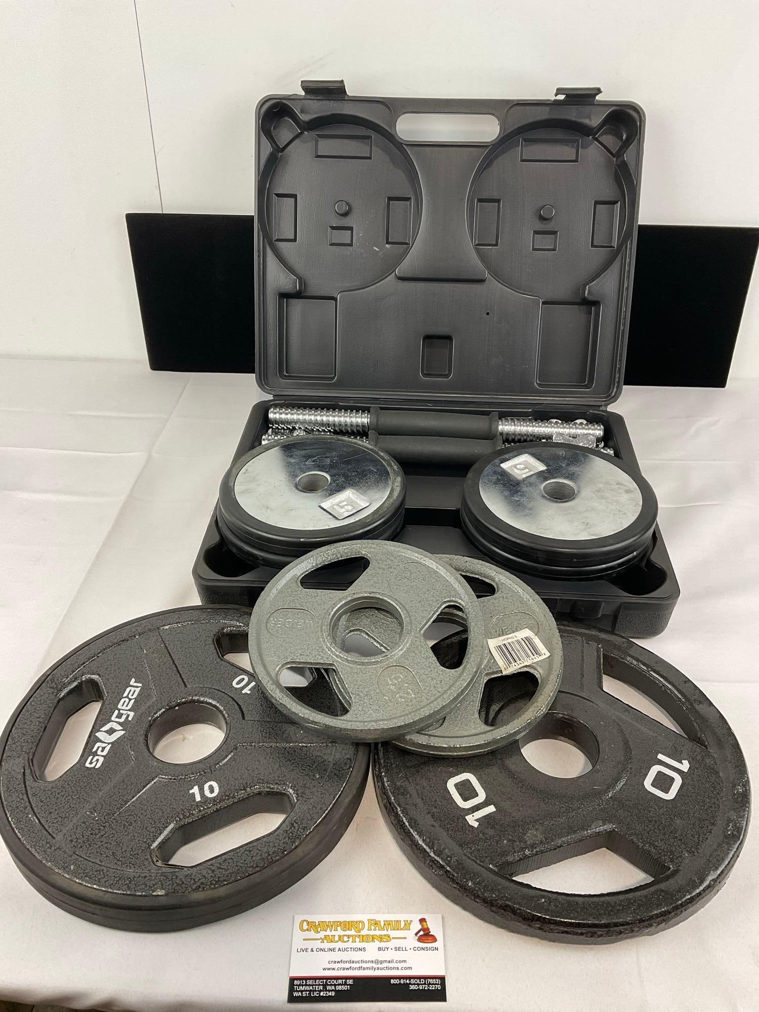 SA Gear Chrome/Rubber Dumbbell Set & 2 2.5 lb plates & 2 10 lb plates, approx 65 pounds all toget...: *No in-house shipping, due to size and weight* Appears to be in good shape. The piece measures approx 7h x 17w x 12d inches. See pics. E-5910 *No in-house shipping, due to size and weight*