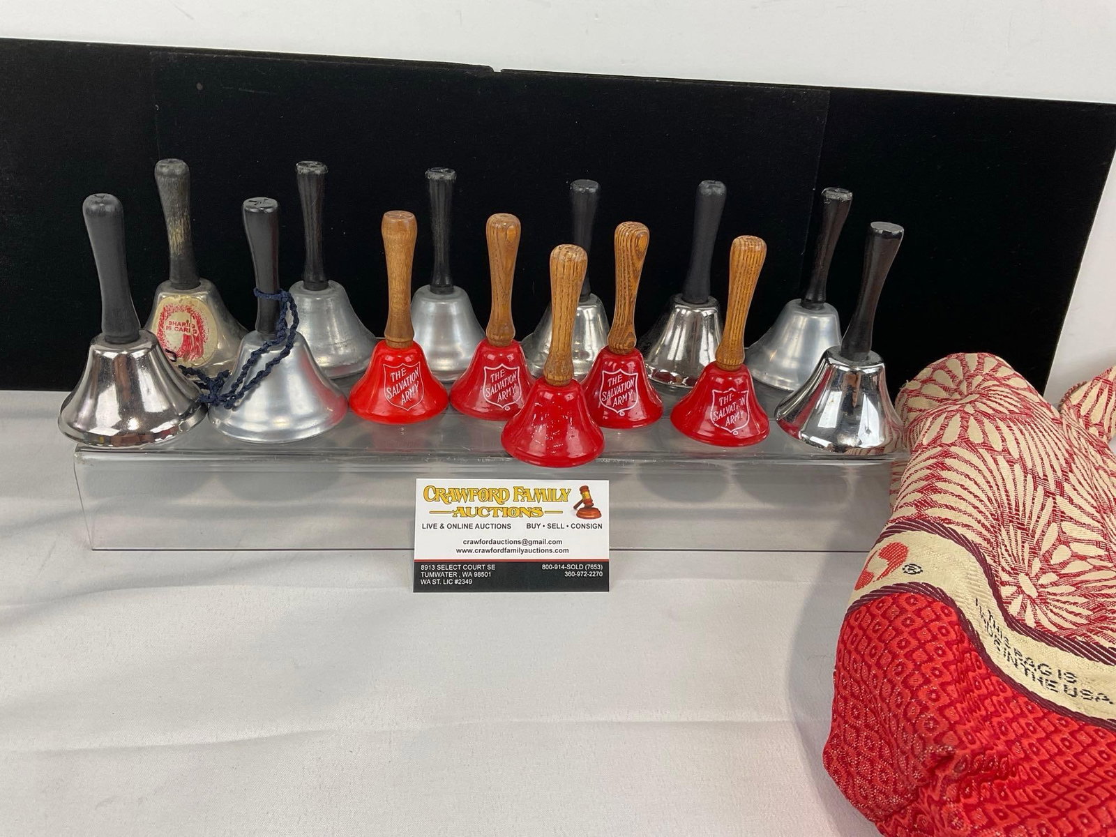 Collection of The Salvation Army Bells, 6 are marked, w/fabric Safeway grocery bag: Appears to be in good shape. The piece measures approx 7h x 10w x 8d inches. See pics. E-5860