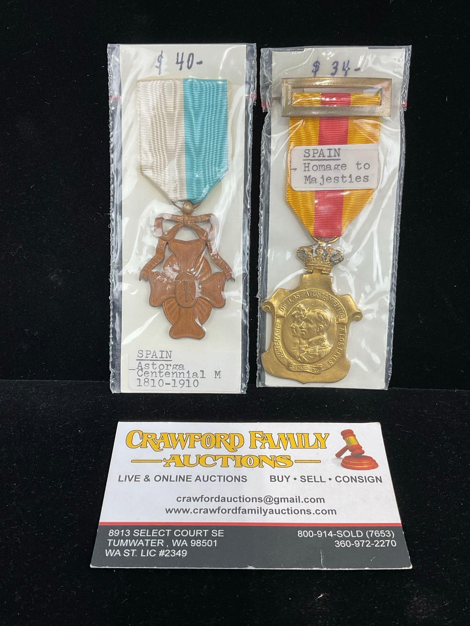 Pair of Spanish Medals, Astorga Centennial 1810-1910 & 1920s Homage to Royal Family, Alfonso XIII: These are briefly described on the tag and were kept in a display. The piece measure approx 6h x 3w x 2d inches. See pics. E-414