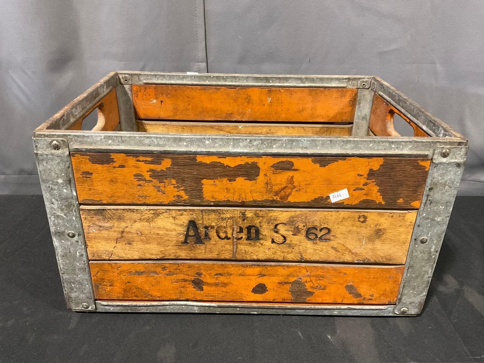Vintage 1962 Wood & Steel Arden Company Milk Storage Crate, 14h x 20w x 14d inches: Similar to the #44 lot, this one has a metal base. Appears to be in good shape. The piece measures approx 14h x 20w x 14d inches. See pics. E-5910