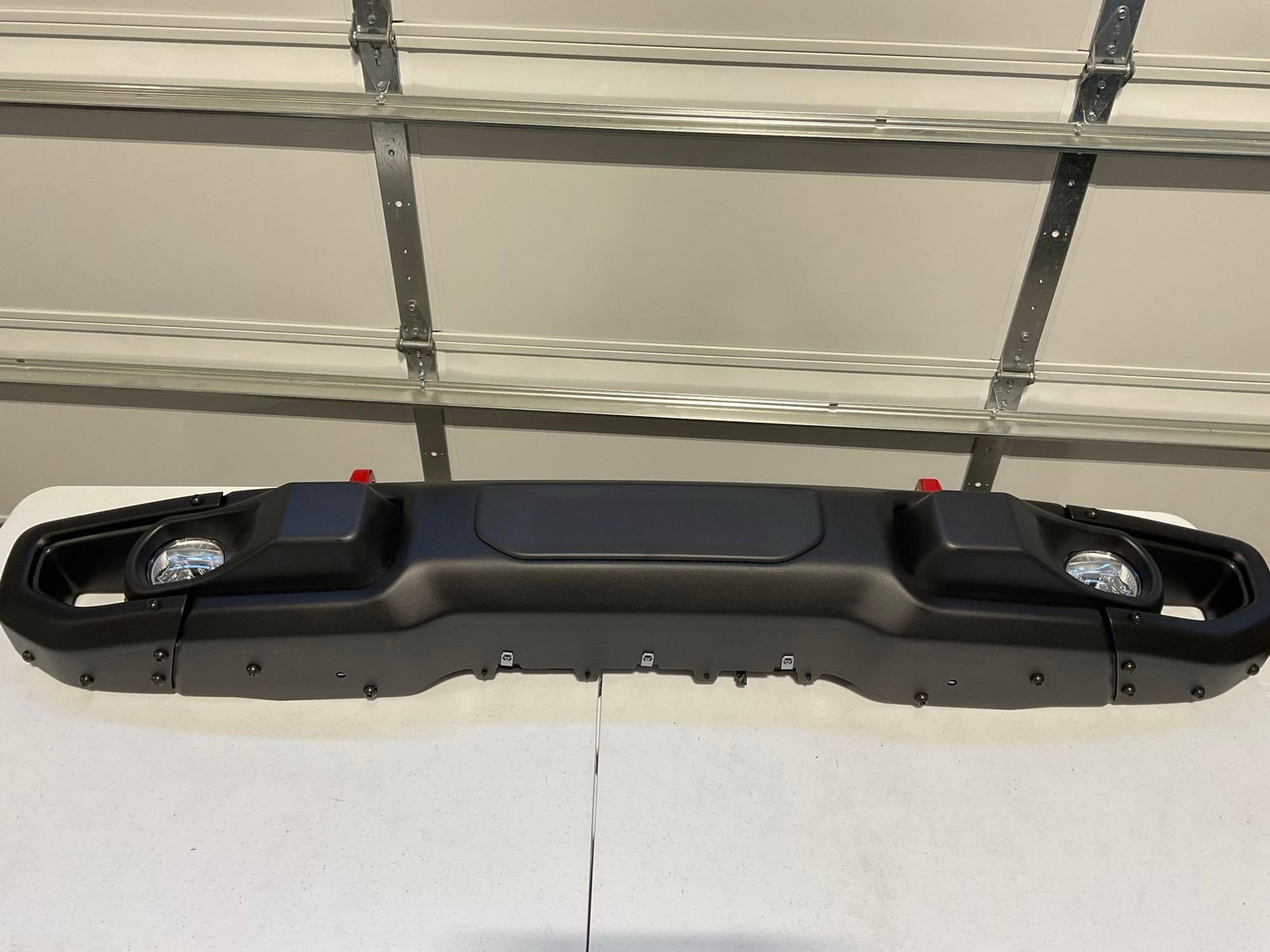 Jeep Rubicon 10th Anniversary Steel Front Bumper, Wrangler JK or JL models, NIB: Marked 7CR05RXFAA. Looks like the piece is about 78 pounds, based on the packaging. Likely no shipping, due to size & weight. Please consider local pickup. Appears to be in good shape. The piece