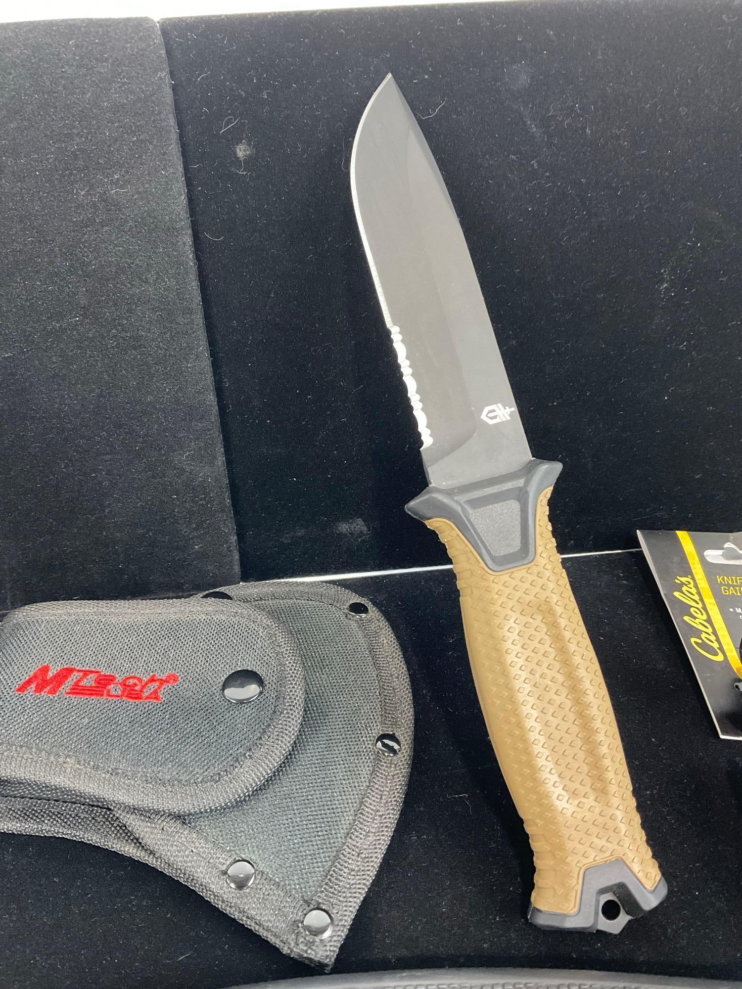 Pair of Fixed Blade Knives, Buck 692, Gerber StrongArm, & MTech USA Hatchet all w/sheathes - 3