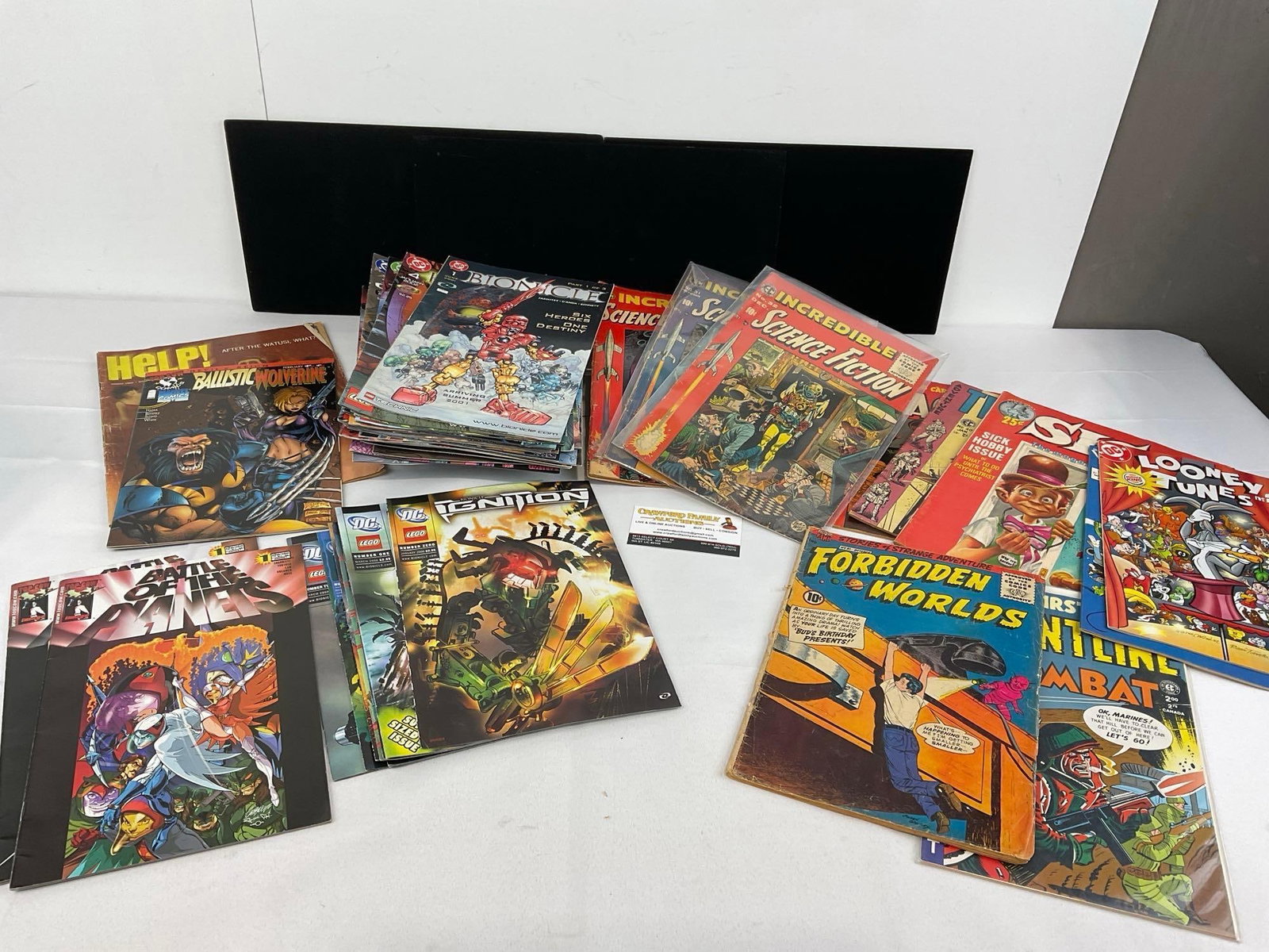 Collection of 46 Comics, Several DC Bionicle incl. #1, 3-5, 7-17, 20-27, Incredible Sci Fi, & more: Bionicle Ignition #0-1, 3-5, 9-12. Appears to be in good shape. The piece measures approx 12h x 9w x 4d inches. See pics. E-2347