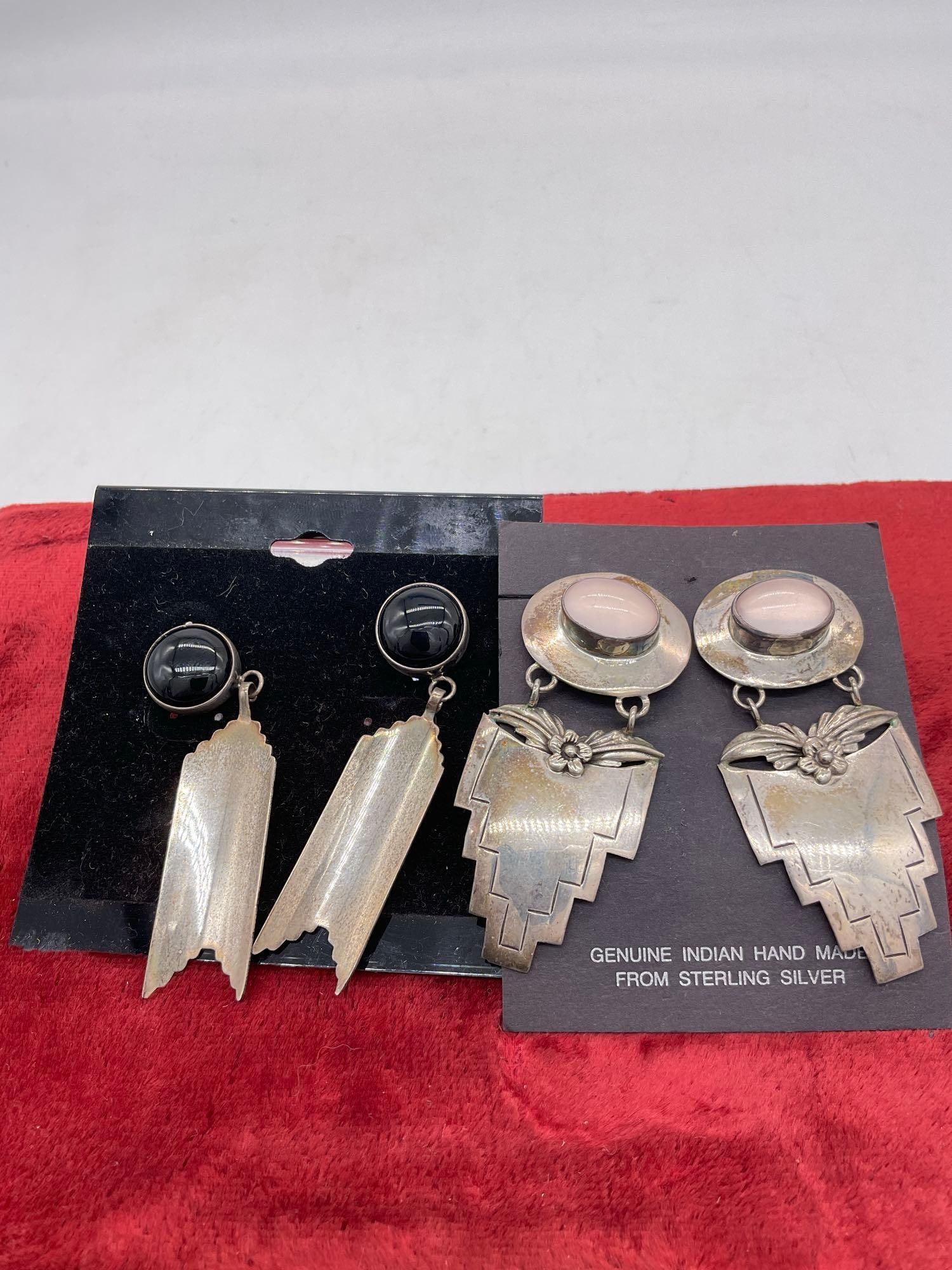 2 pair Of Sw Native American Sterling Silver earrings w/ Pink Shell & Onyx - Carol Felley & Nakai: Both sets are Approx 2.5" in length The Vintage pair of Black onyx and feather designed post earrings are signed Nakai Nakai refers to several Navajo silversmiths, often