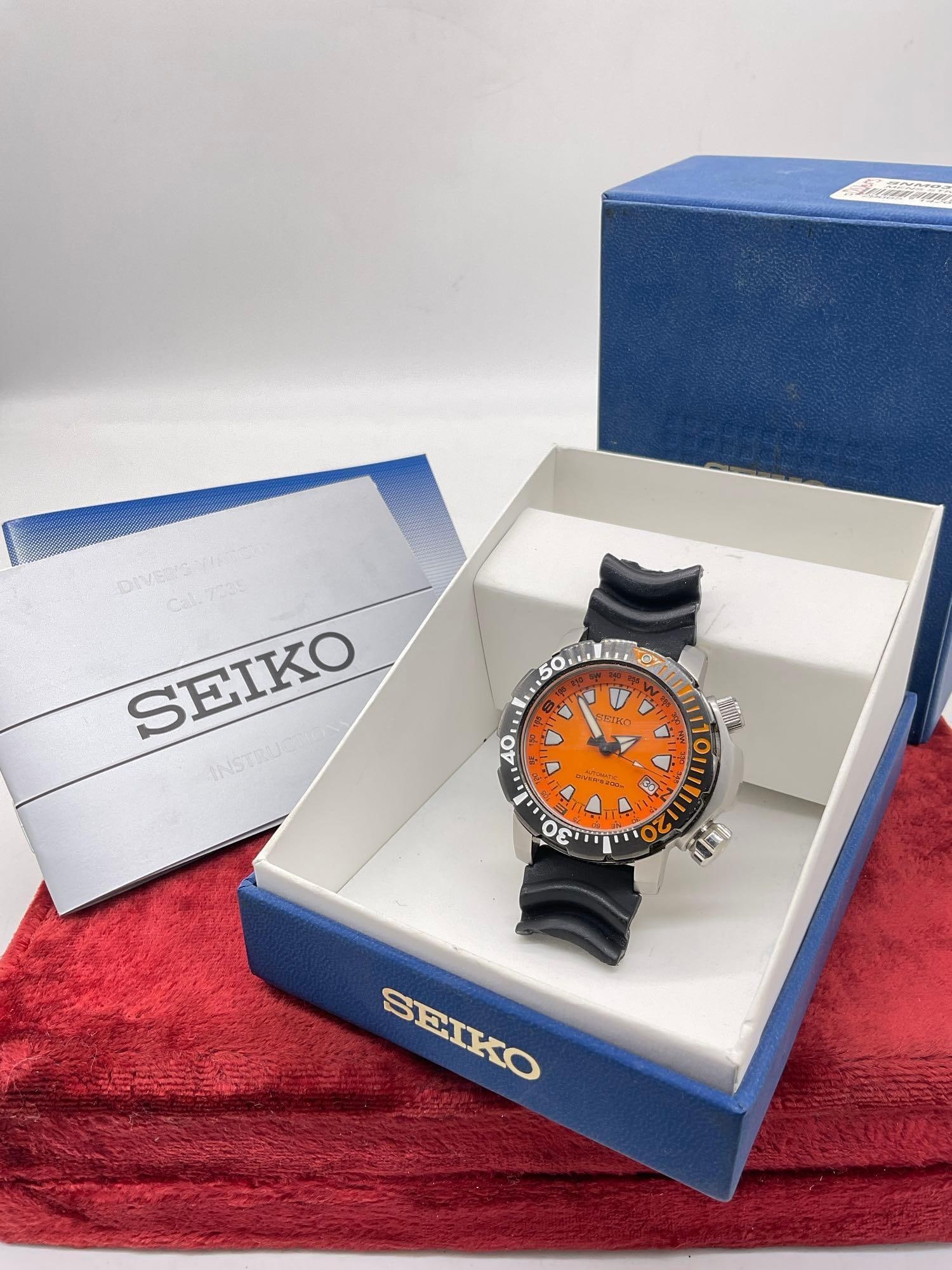 RARE Seiko 23 Jewel SNM037 Men's Orange Land Monster 200m Diver Watch 7S35-00F0 Running: c-5910 Come with OG Box & Manuals. Watch is running May need service. Needs New Band Sold As-Is The Seiko 7S35-00F0, commonly known as the Seiko Land Monster, specifically models