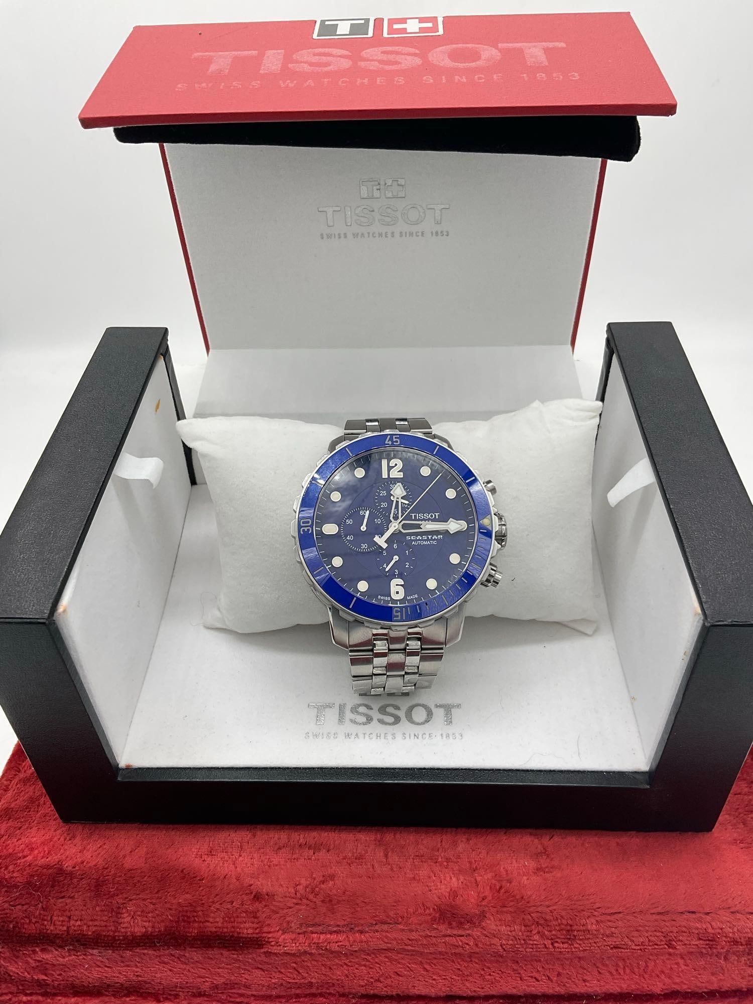 Nice Tissot 1853 Seastar 30 bar 15 jewels Swiss made Men's chronograph Watch W/ OG BOX & Manuals: C-5910 Watch is running Sold As IS Serial # 12BC0056637 AI Generated info The Tissot Seastar 1000 is the model typically associated with a "30 bar" water resistance rating, meaning it is