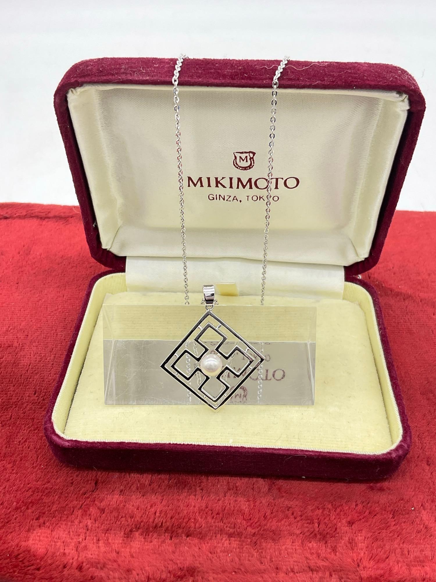Mikimoto 17" necklace w/ single pearl set in a rectangular pendant Comes in OG Box: 5830 Come in OG box necklace and pendant features Mikimoto hallmark 