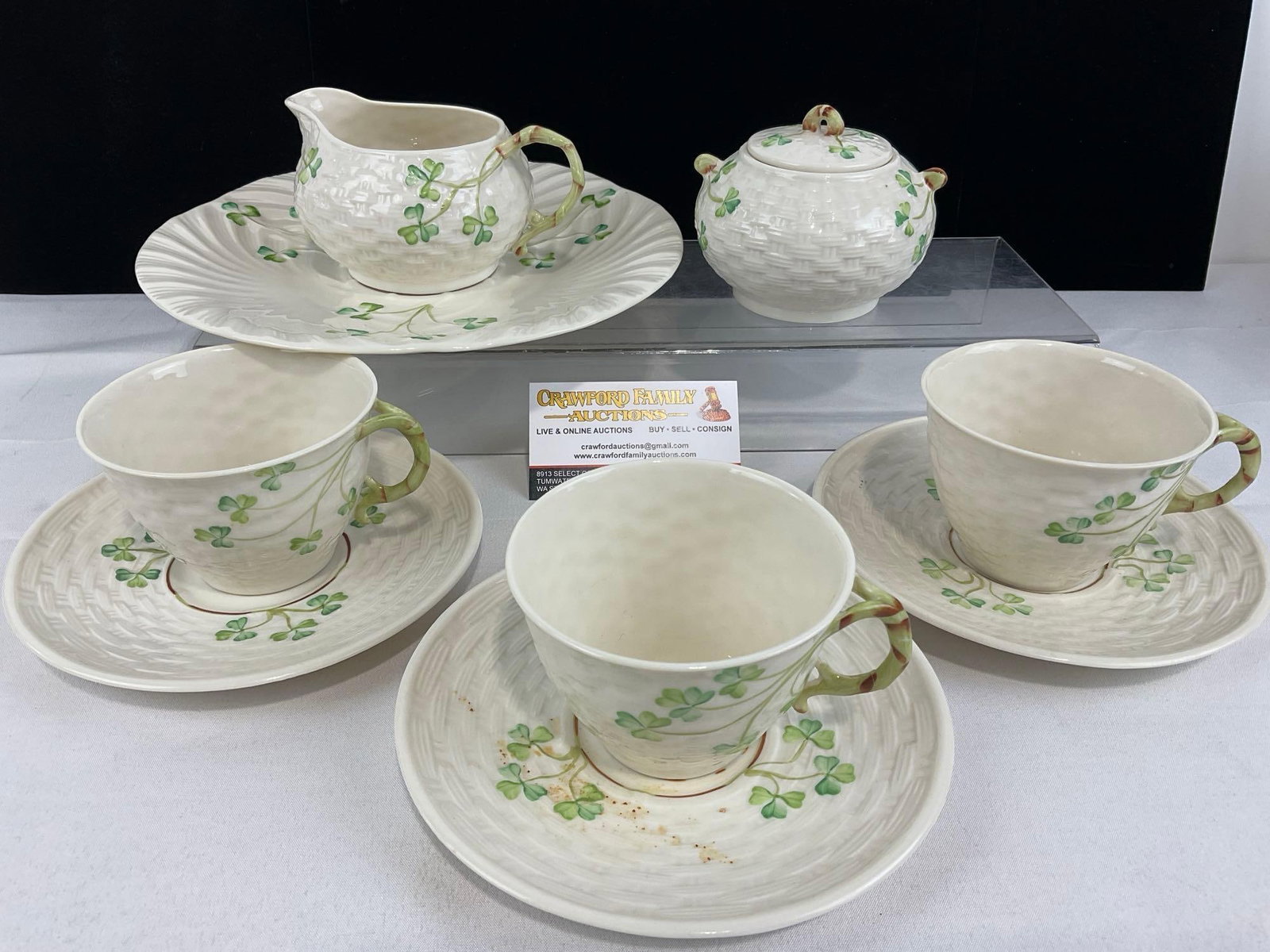 Belleek Irish China, 9 pieces, 1965-80 era green marks, cups & saucers, sugar & Creamer & Plate: Appears to be in good shape. The piece measures approx 6h x 12w x 12d inches. See pics. E-5860