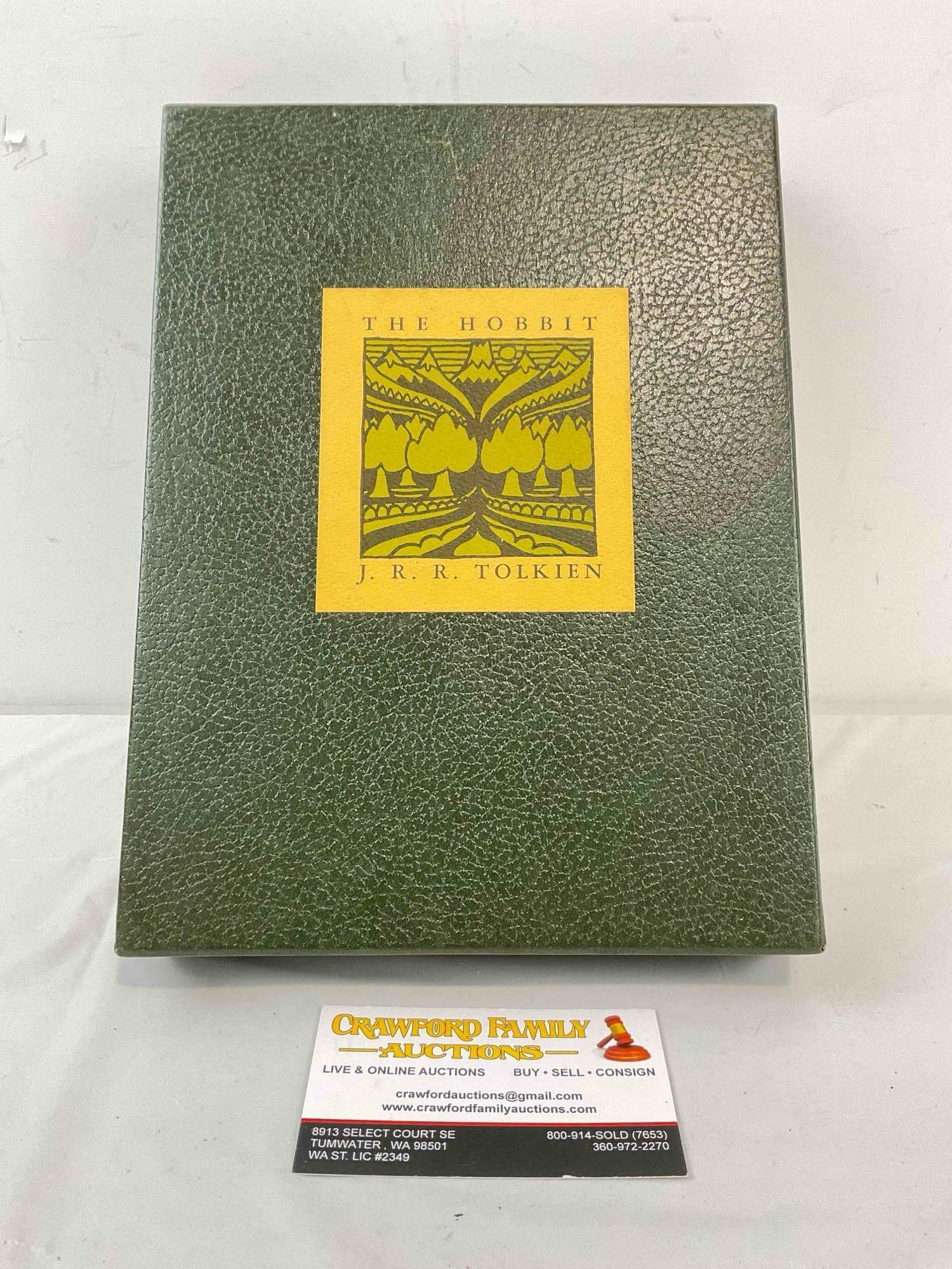 Vintage Hardcover Leather Bound Book "The Hobbit" by J.R.R. Tolkien. Good Condition. See pics.: Vintage Hardcover Leather Bound Book "The Hobbit" by J.R.R. Tolkien. Good Condition. Comes with sleeve. Published 1966. Minor wear indicative of age and use, otherwise looks to be in good condition. M