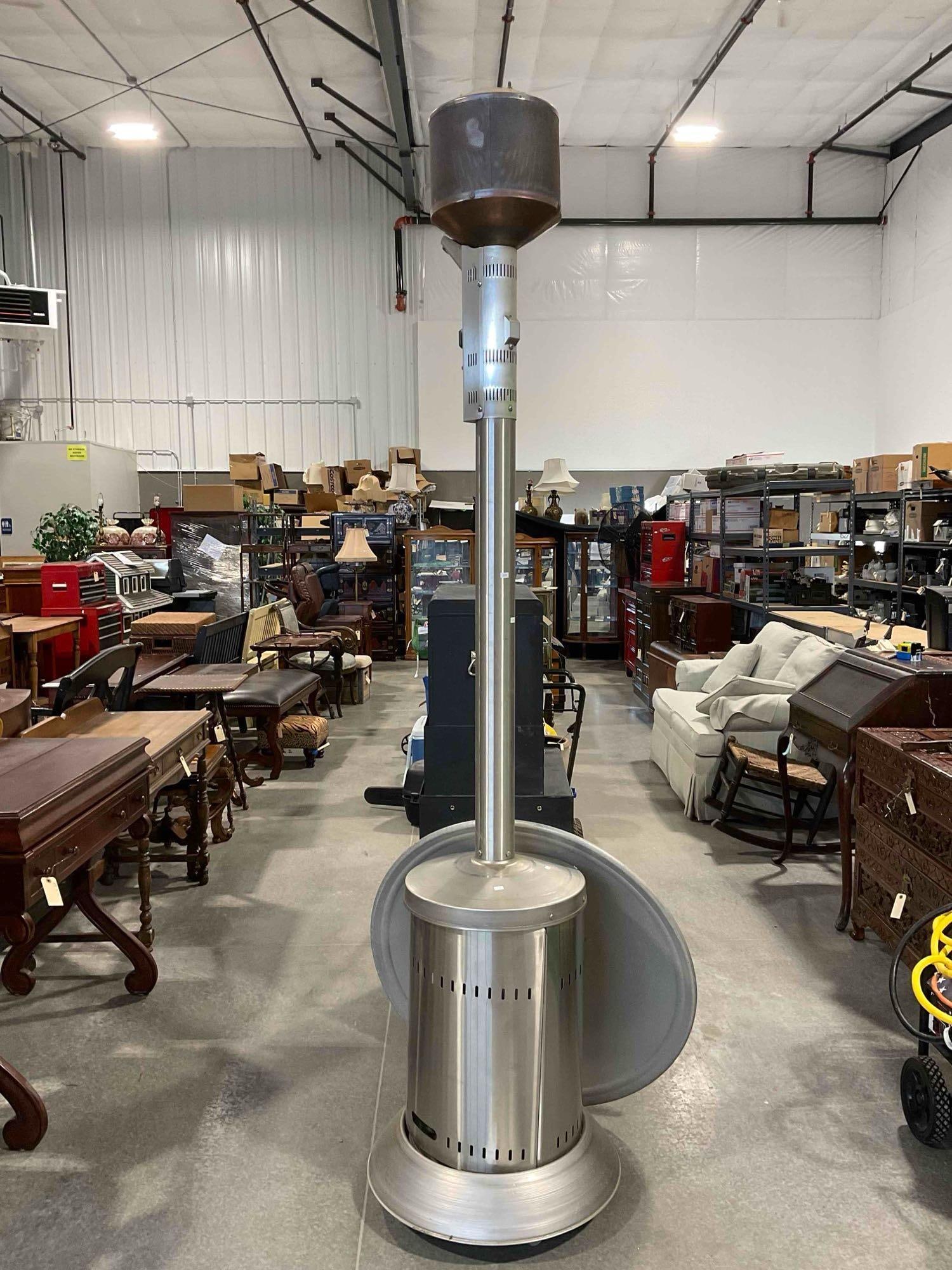 Phoenix Propane Powered Patio Heater Model DCSPHFS. Untested, Working at Consignor's.: Phoenix Propane Powered Patio Heater Model DCSPHFS. Untested, Working at Consignor's. Minor wear indicative of age and use, otherwise looks to be in good condition. Measures 36" x 36" x 95"