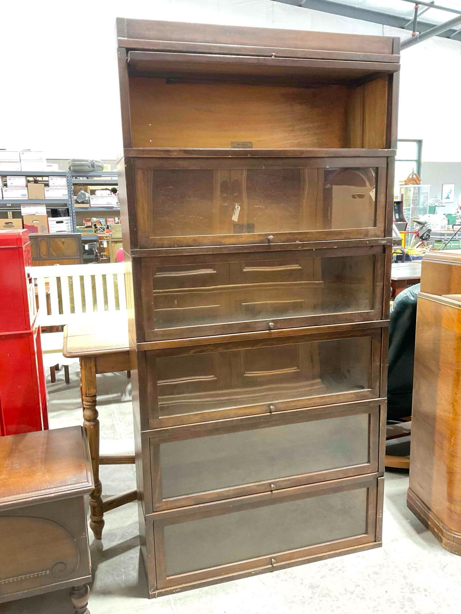 Vintage Globe-Wernicke 6-Tier Glass Fronted Sectional Book Case. Fair Condition. See pics.: Vintage Globe-Wernicke 6-Tier Glass Fronted Sectional Book Case. Fair Condition. Missing the pivot for the top case, piece has wear and staining indicative of being stored near water, glass shows