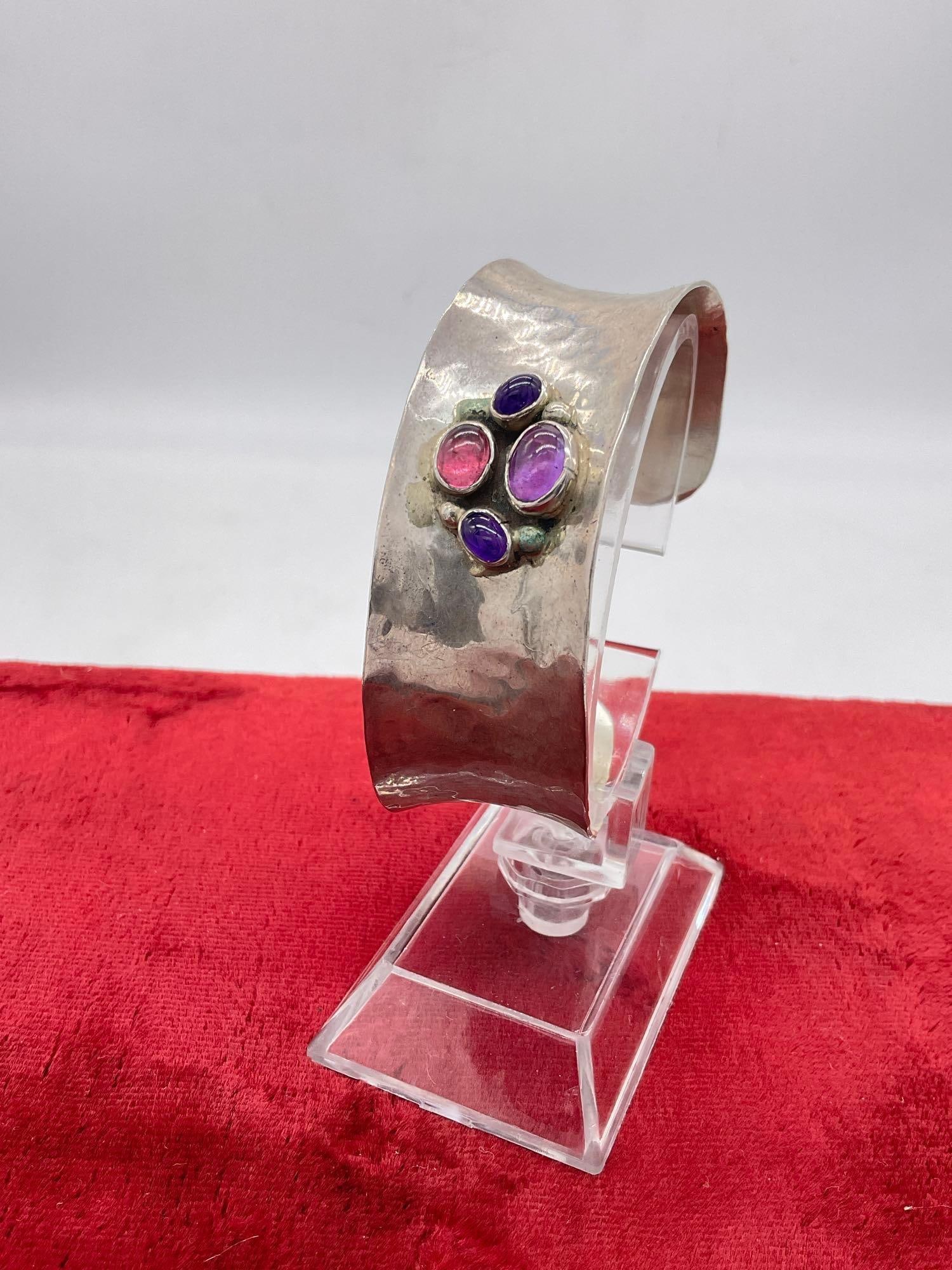 1986 Carol Felley Native American design Sterling silver Cuff Bracelet w/ blue stones Signed CF 86: 33.67 Grams CF is the hallmark for well respected Carol Felley, and is an American jewelry designer recognized for her Southwestern-inspired sterling silver pieces that frequently incorporate Native A