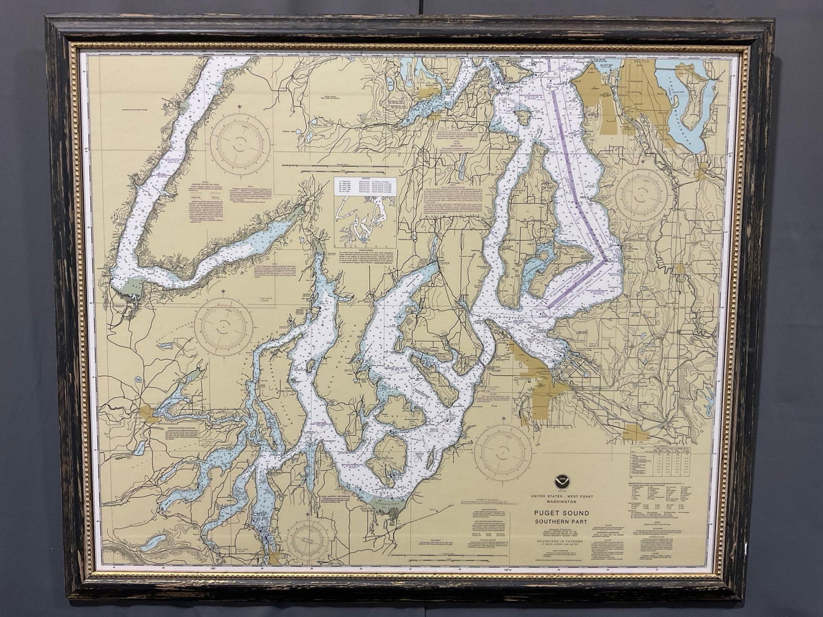 Framed Map, NOAA Coast Survey United States West Coast Washington from 1983, 37h x 44w inches: *No in-house shipping, due to size* Appears to be in good shape. The piece measures approx 37h x 44w x 4d inches. See pics. E-5860 *Freight Required if shipped, Buyer