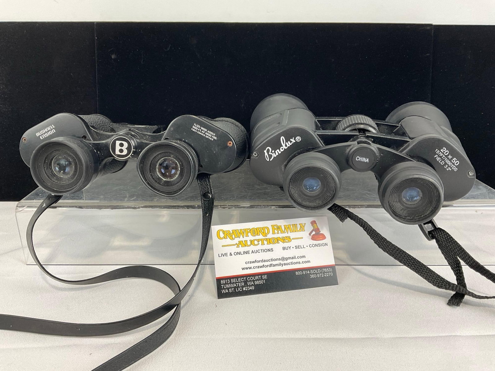 Pair of Binoculars, Bushnell Ensign 7x35 Wide Angle & Binolux 20 x 50 Field 3.2 degree: Appears to be in good shape. The piece measures approx 8h x 8w x 6d inches. See pics. E-5860