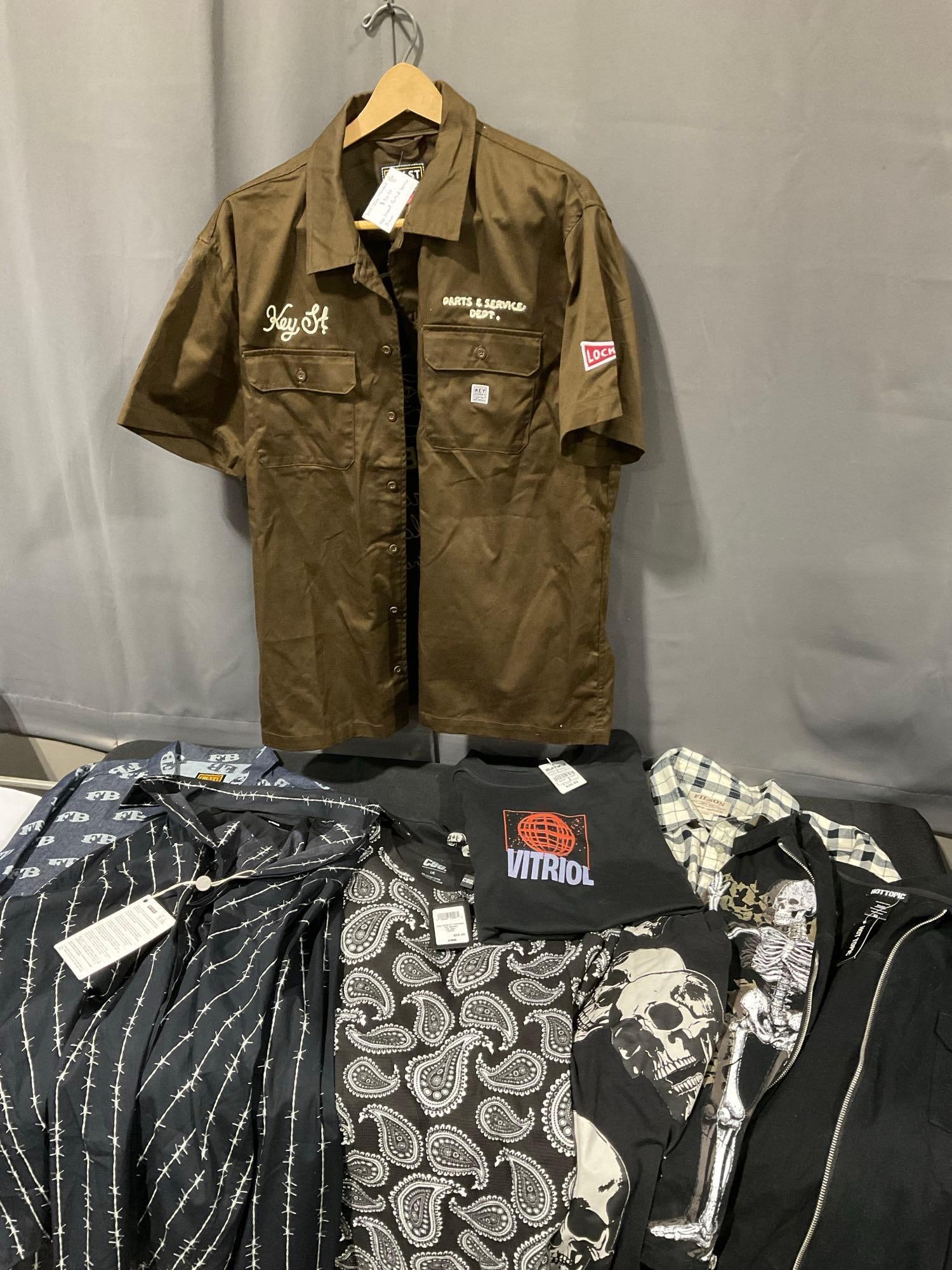 Collection of Clothes, Long Sleeve Shirts, Button Up, & more, Paisley, Skull & Barbed Wire pattern: Appears to be in good shape. The piece measures approx 8h x 21w x 12d inches. See pics. E-5910