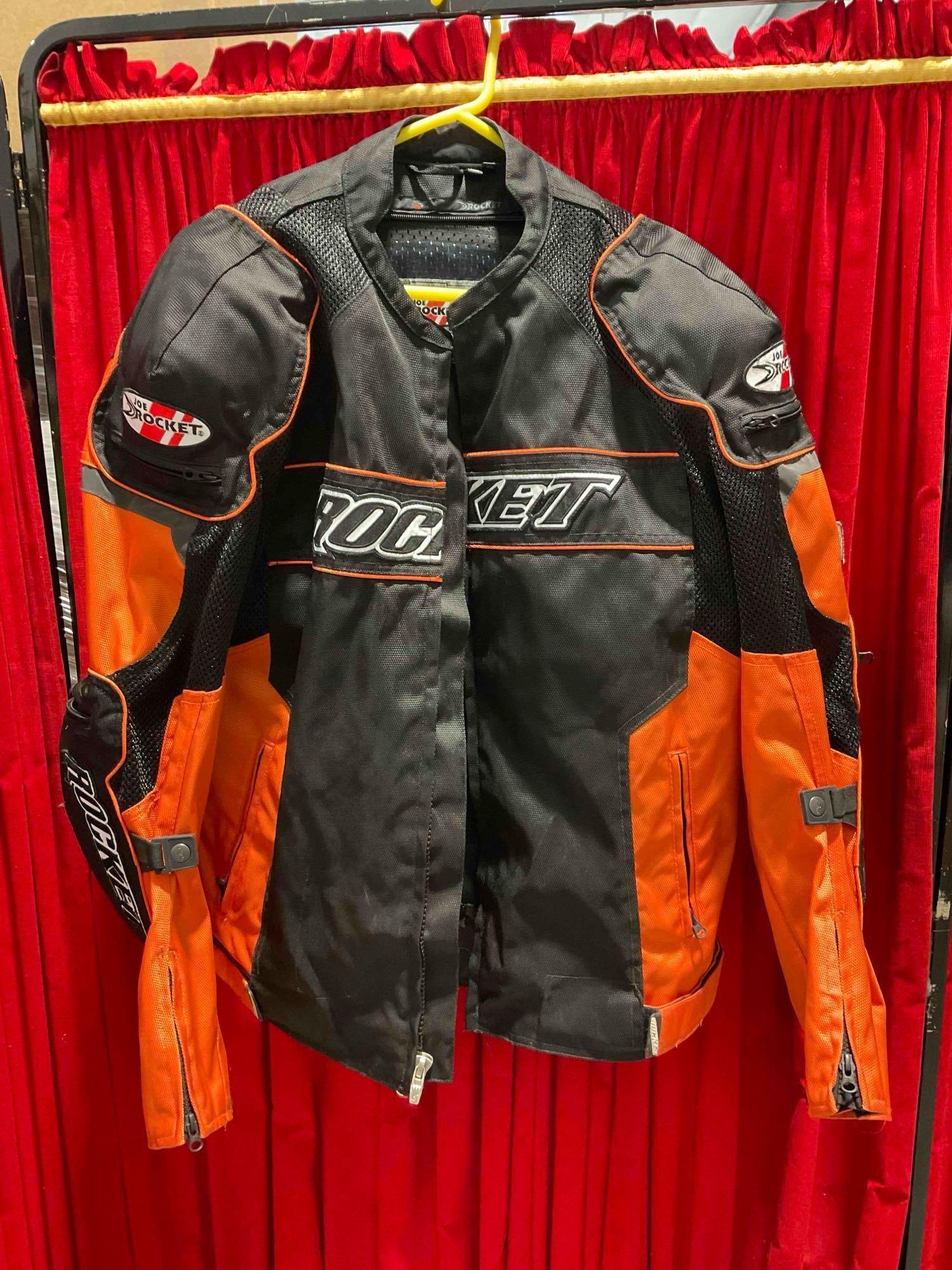 Joe Rocket Orange & Black Nylon Motorcycle Racing Jacket in Size XL. Good Condition. See pics.: Joe Rocket Orange & Black Nylon Motorcycle Racing Jacket in Size XL. Good Condition. Looks to be in good condition, consignor was a collector who kept jackets in storage. Measures 26" x 30" x 4"