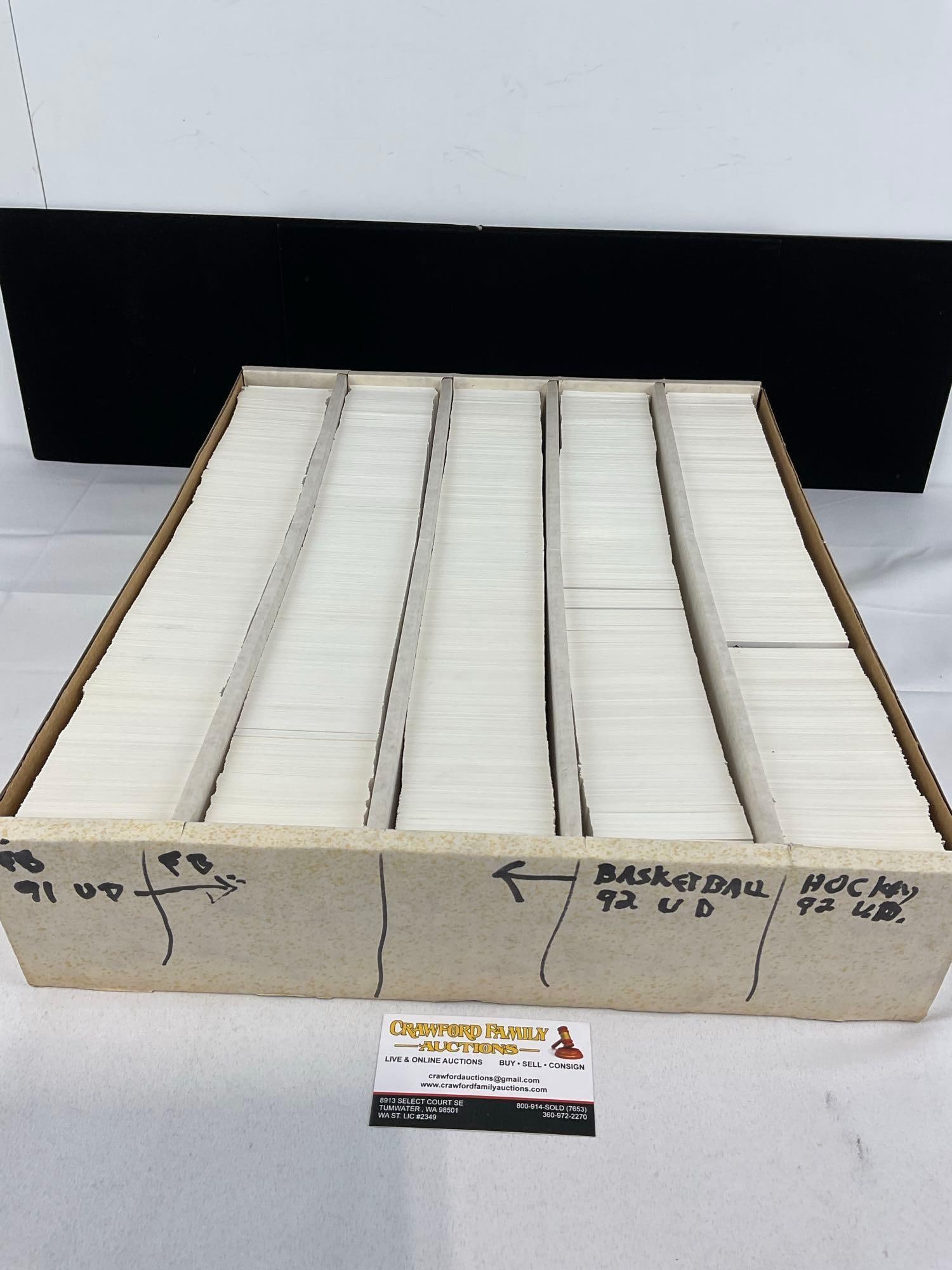 Box of Vintage 5k Sports Cards, 91-93 Football, Basketball, & Hockey, Upper Deck, & more: Large box of sports cards, unresearched, and all from the same collection. Appears to be in good shape. The piece measures approx 5h x 19w x 16d inches. See pics. E-5940
