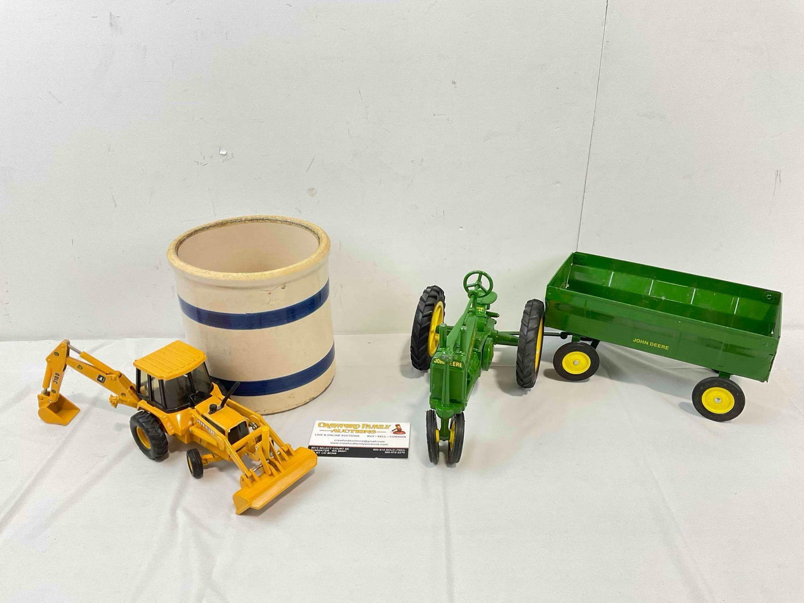 4 pcs Vintage Collectibles, incl. Robinson Ransbottom Ceramic Crock & 3x ERTL Diecast Models.: 4 pcs Vintage Collectibles, incl. Robinson Ransbottom Ceramic Crock & 3x ERTL Diecast John Deere Models, Model A Tractor w/ Trailer and 310D backhoe. Minor wear indicative of age and use, otherwis