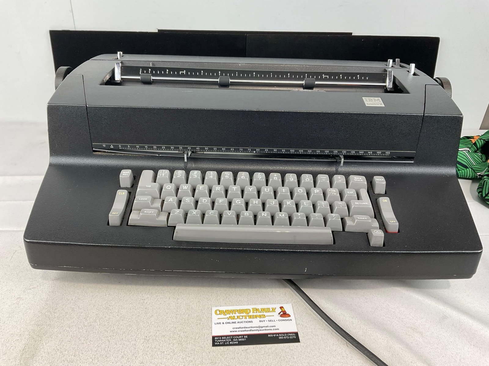 IBM Selectric 2 Typewriter, Cast Metal, untested, black finish: Similar to the next piece. Quite Heavy, solid construction. Appears to be in good shape, likely needs some servicing. The pieces fit in a box that measures 8h x 23w x 16d inches. See pics.