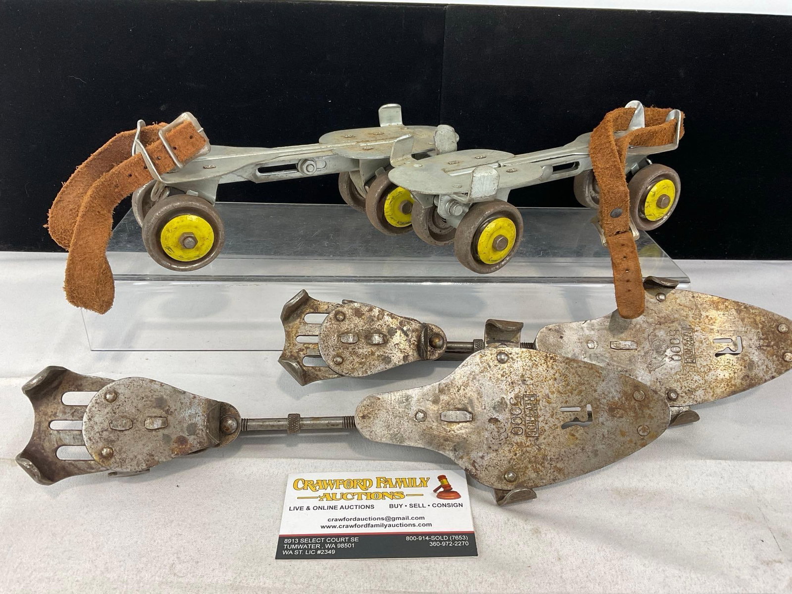 Pair of Union Hardware Co Roller Skates, & Rev-O-Noc 5000 Ice Skates: Appears to be in fair to good shape. The piece measures approx 18h x 8w x 7d inches. See pics. E-5360
