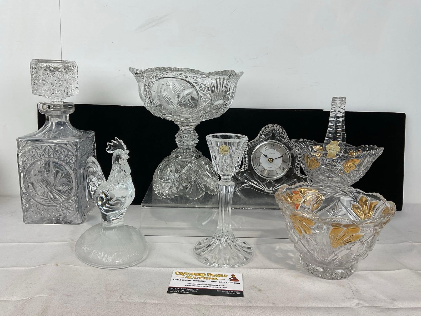 Assorted Crystal, Chicken Figure, Footed Compote, Basket & Vase, Mantel Clock, & Decanter: Appears to be in fair to good shape, the decanter has a broken rim. The piece measures approx inches. See pics. E-5360