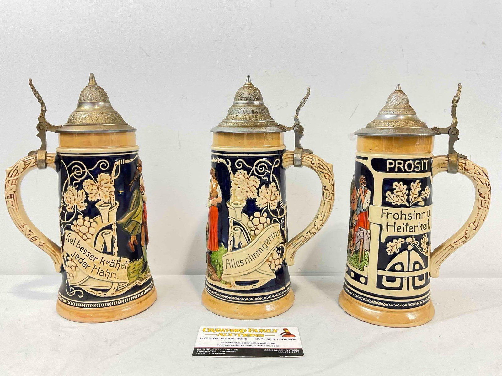 3 pcs Vintage German Ceramic Souvenir Beer Steins, Cobalt Blue glaze: 3 pcs Vintage German Ceramic Souvenir Beer Steins. Fair to Good Condition, some discoloration of the lids. Minor wear indicative of age, condition is otherwise good. Measures approx 10h x 11w x